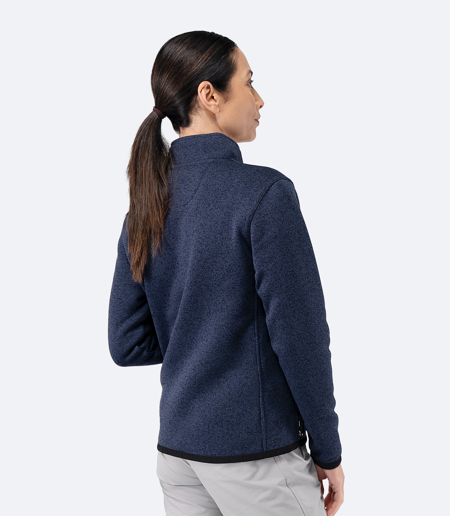 Back view of Zhik Women’s Knit Fleece Jacket in dark navy marle with stand collar