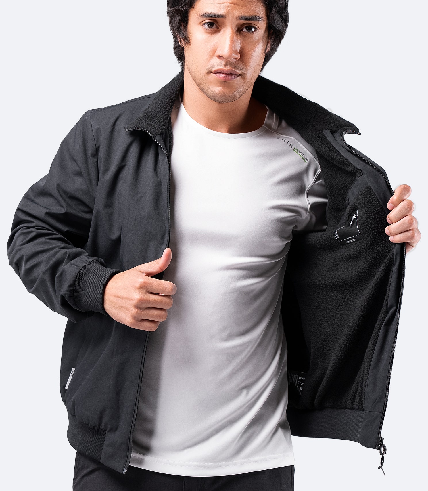 Men's Flight Jacket in black, open zipper front view – fleece-lined interior for warmth and a water-resistant outer shell.