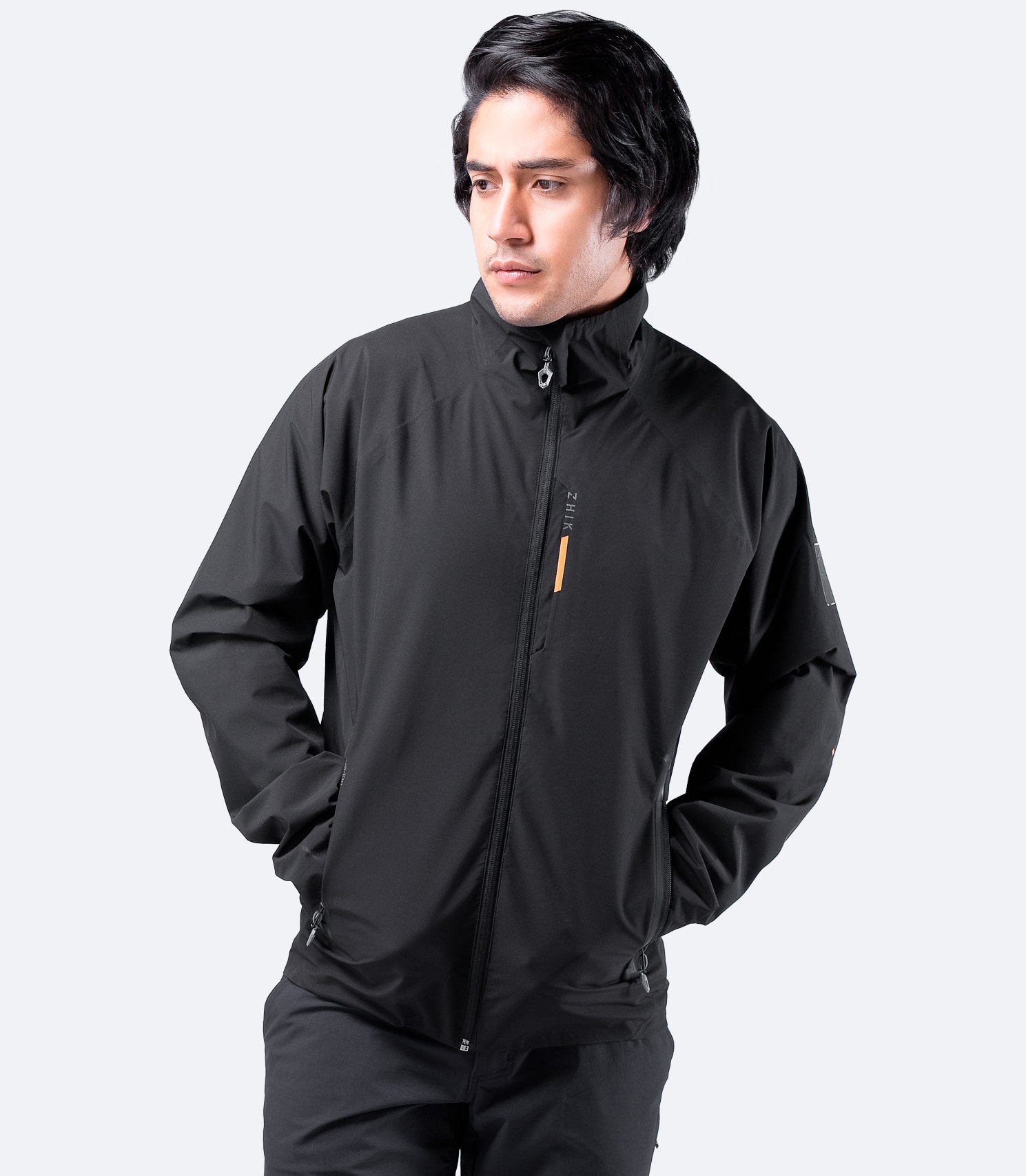 Zhik Men's INS100™ Jacket in Black – waterproof, breathable, and lightweight with a streamlined fit for inshore sailing