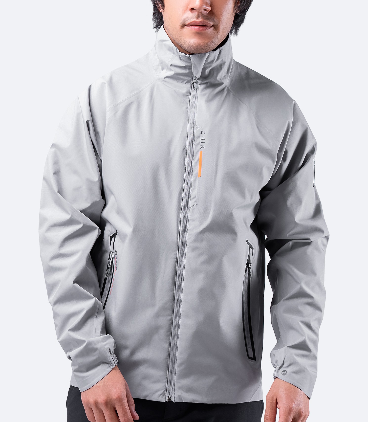 Front view of Zhik Men's INS100™ Jacket in Platinum with closed zipper, showcasing lightweight, breathable construction and zippered side pockets.