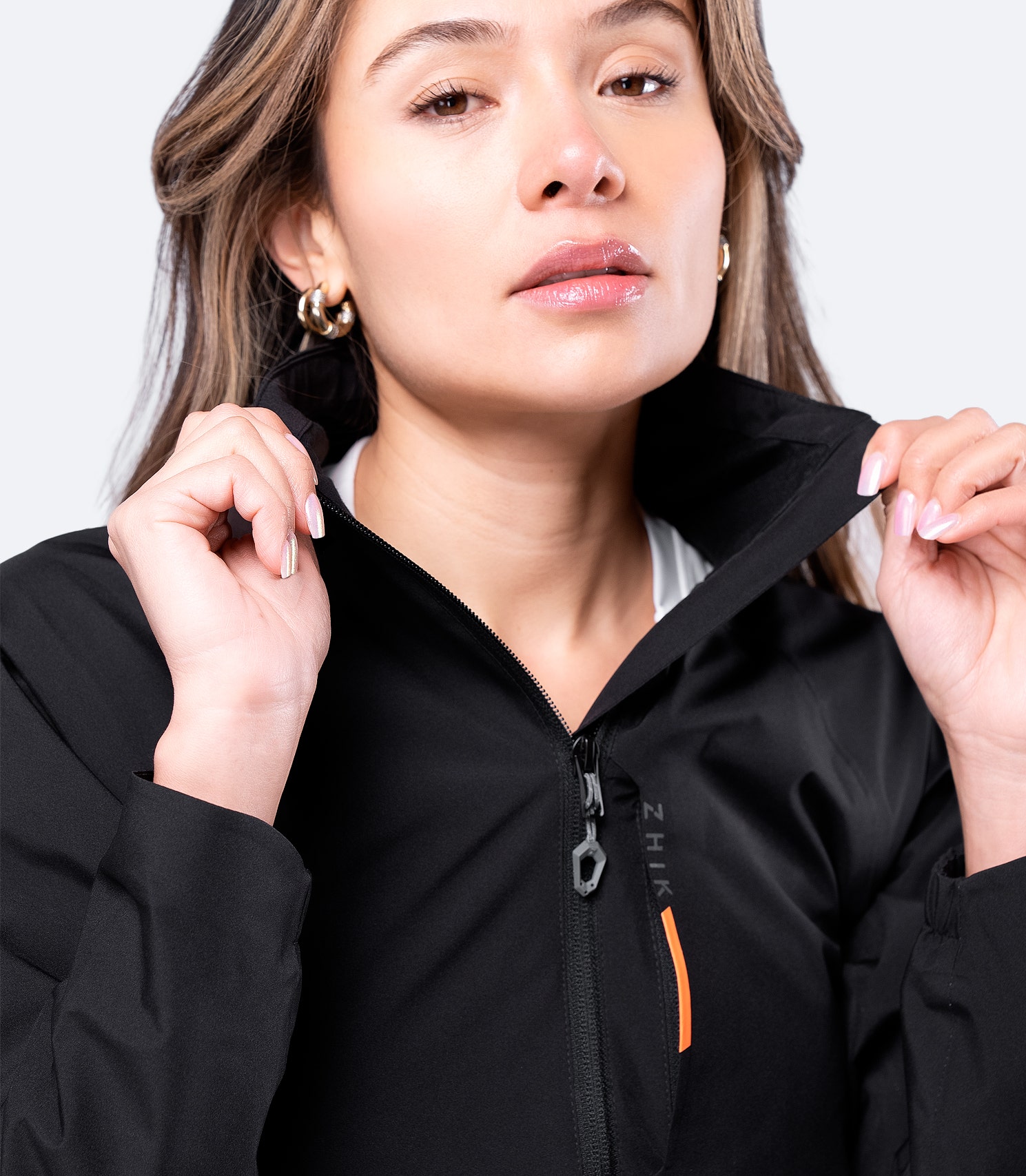 Collar close-up of Zhik Women's Black INS100™ Jacket, showing soft lining and protective waterproof Vecta fabric.
