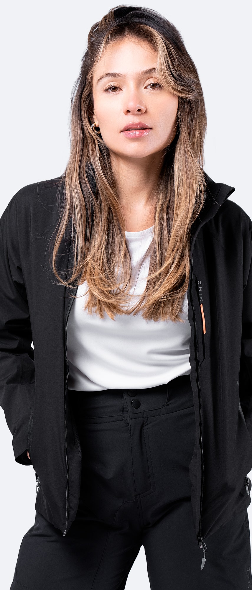 Women's Black INS100™ Jacket, worn open to reveal soft mesh lining for airflow and temperature regulation.