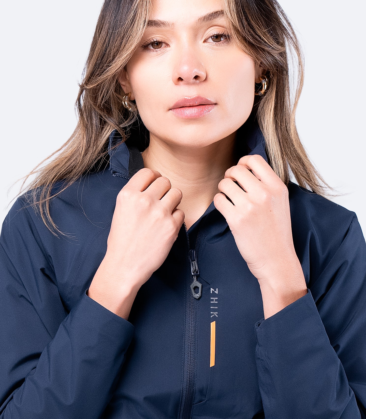 Collar close-up of Zhik Women's Navy INS100™ Jacket, featuring soft inner lining and protective waterproof Vecta fabric.