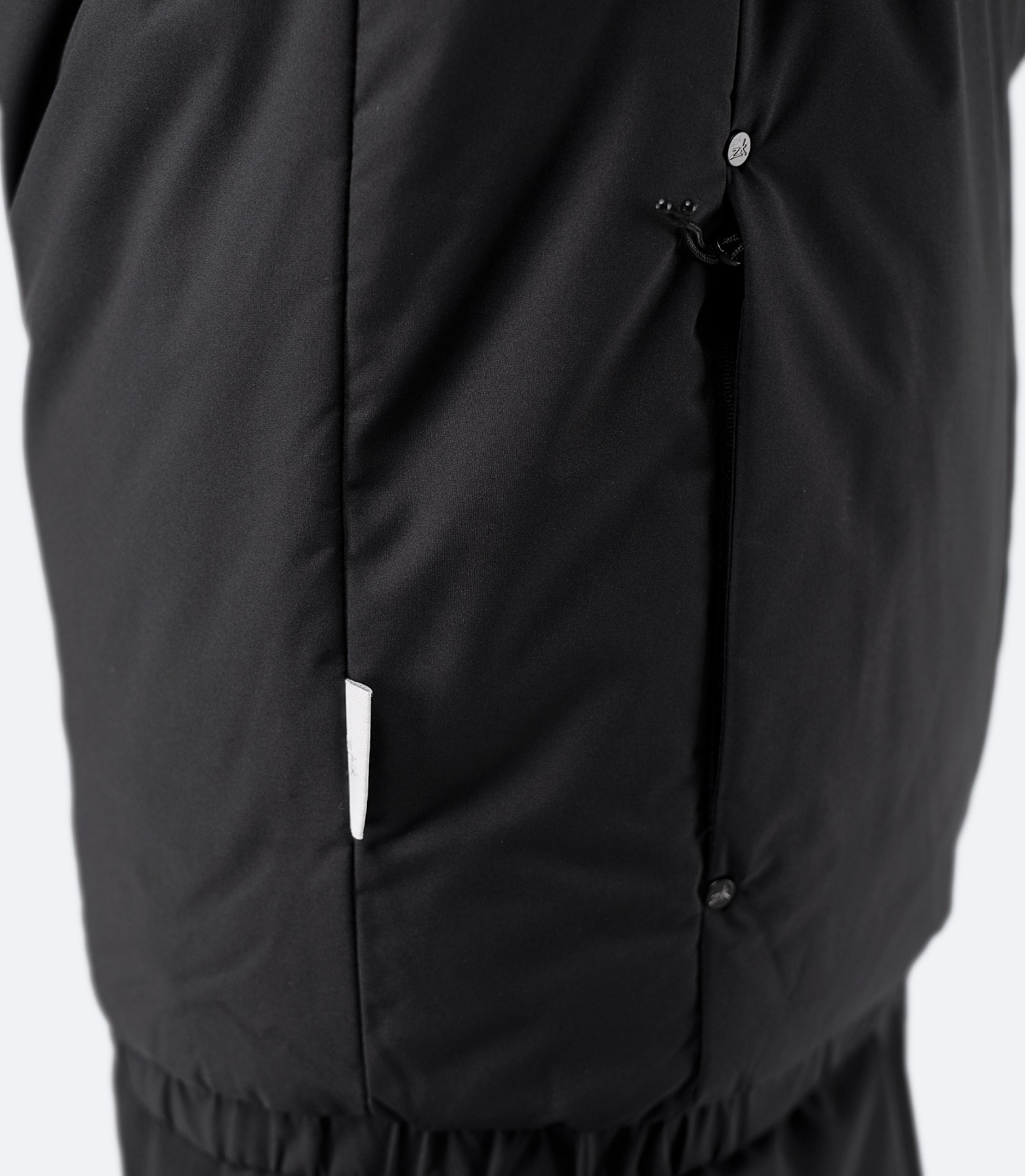 Close-up of zippered side pocket detail on Zhik Women’s Daybreaker Mid-layer Jacket