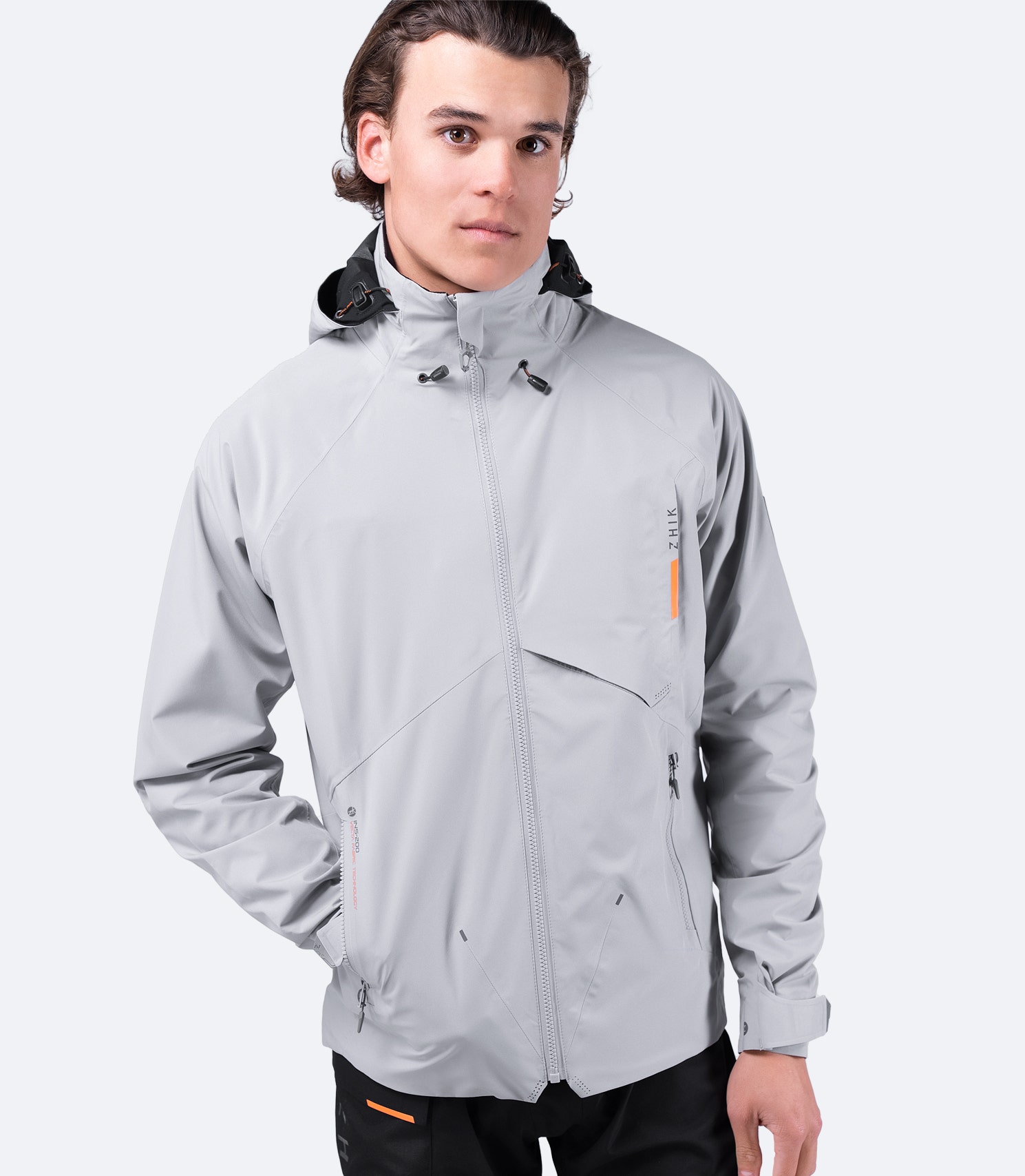 Front view of Zhik Men's INS200 Jacket in Platinum with hood down and zipper up, showcasing a sleek fit and waterproof design