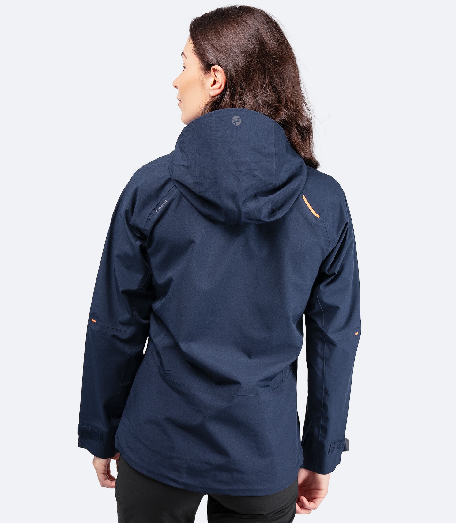 Rear view of Zhik Women's Midnight Blue INS200 Jacket with hood down, showing adjustable high-coverage design for weather protection