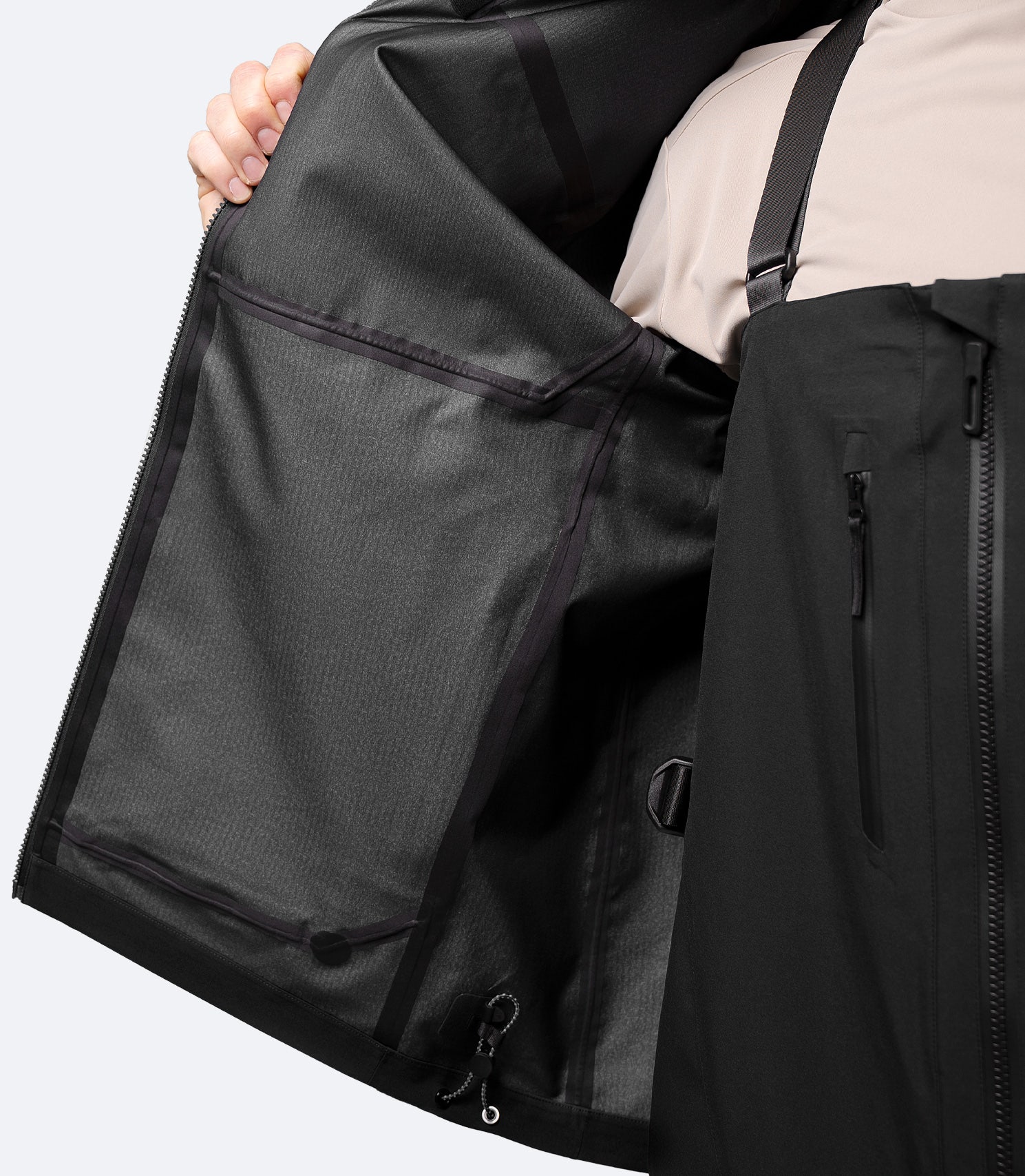 Close-up of interior 3-layer fabric on Zhik Men's Black INS400 inshore jacket for waterproof breathability