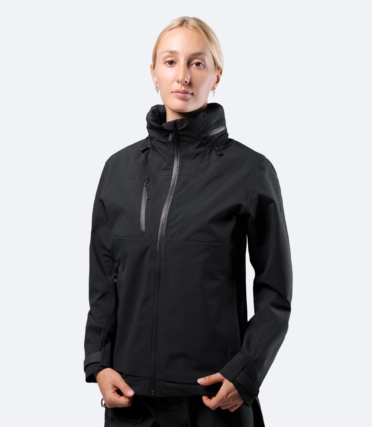 Zhik Women's INS400 jacket in Black, hood stowed and zip up, clean front view for inshore performance