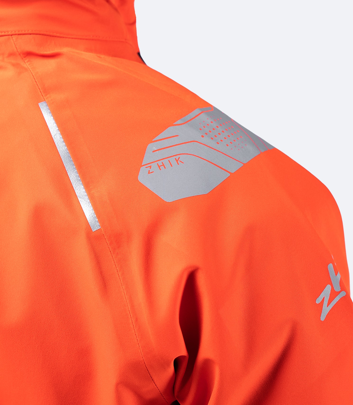 Close-up of reflective shoulder detailing on Flame Red CST500™ Jacket, designed for enhanced low-light visibility and safety.