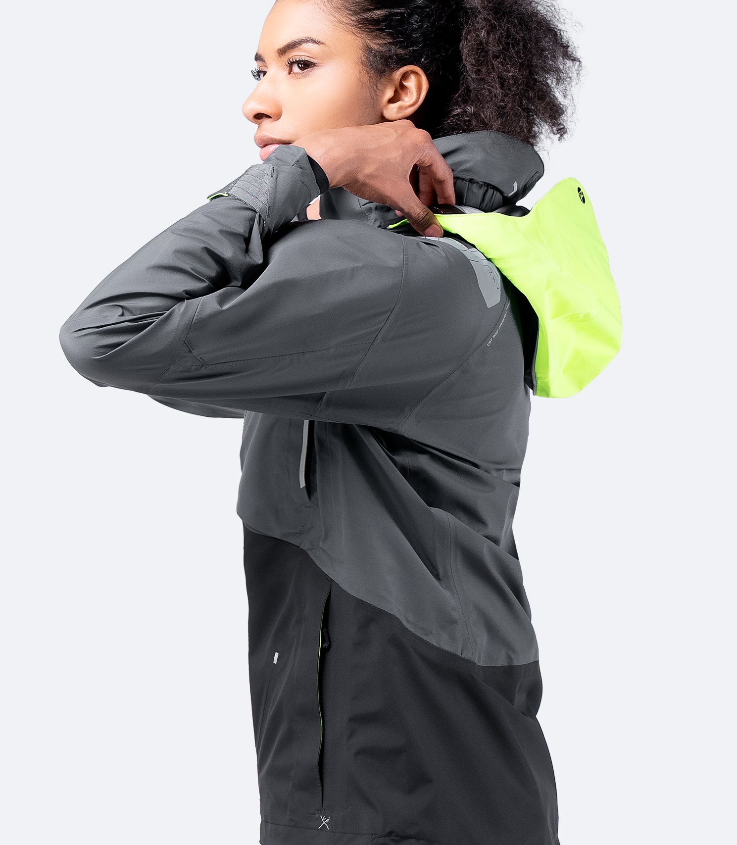 Side view of CST500™ Jacket in anthracite, highlighting articulated arm panels for freedom of movement and streamlined performance fit.