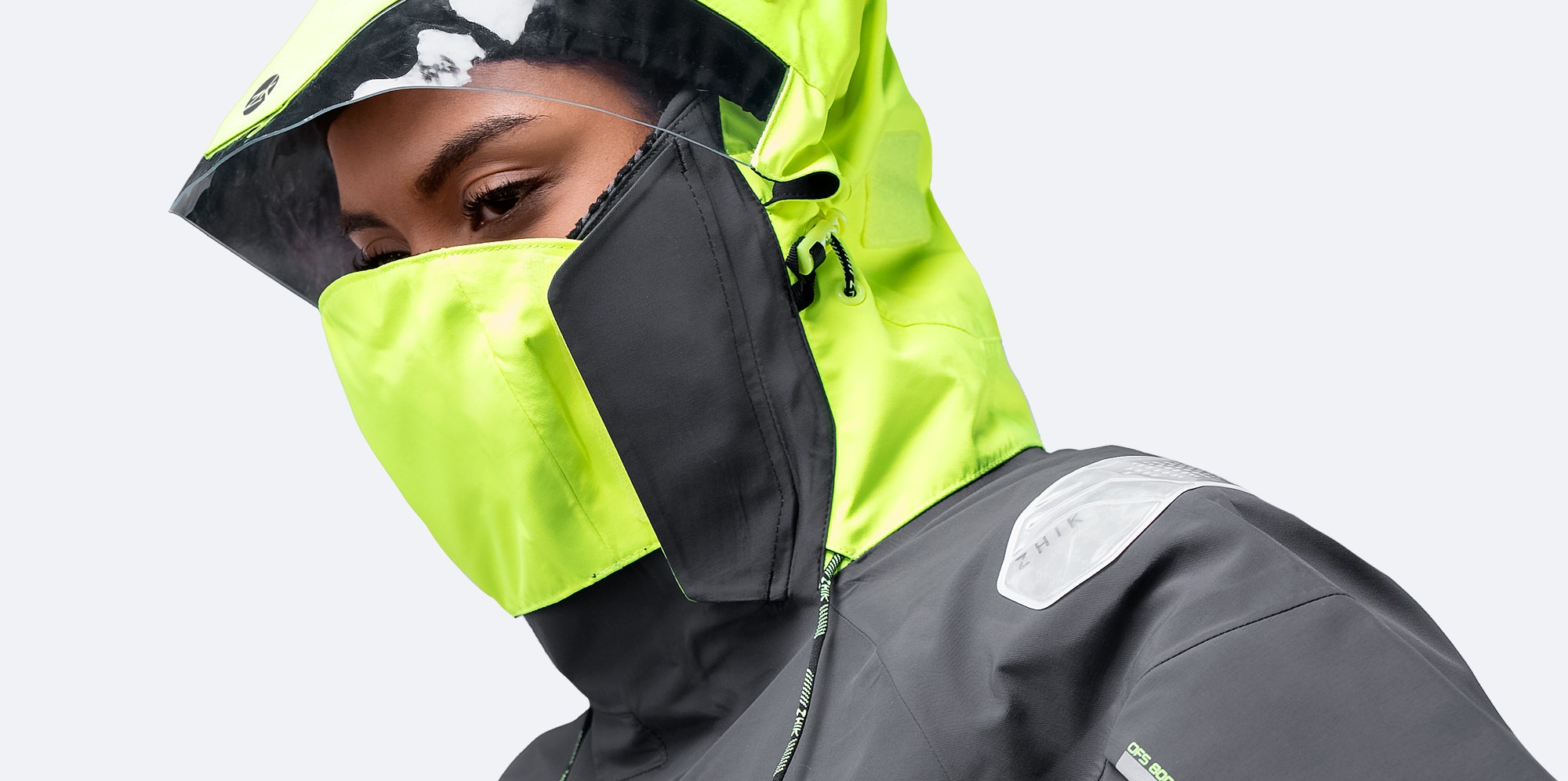 Close-up of Zhik OFS800™ Jacket in black, showing Hydrovision™ visor and hood with 3-point adjustment for superior visibility.