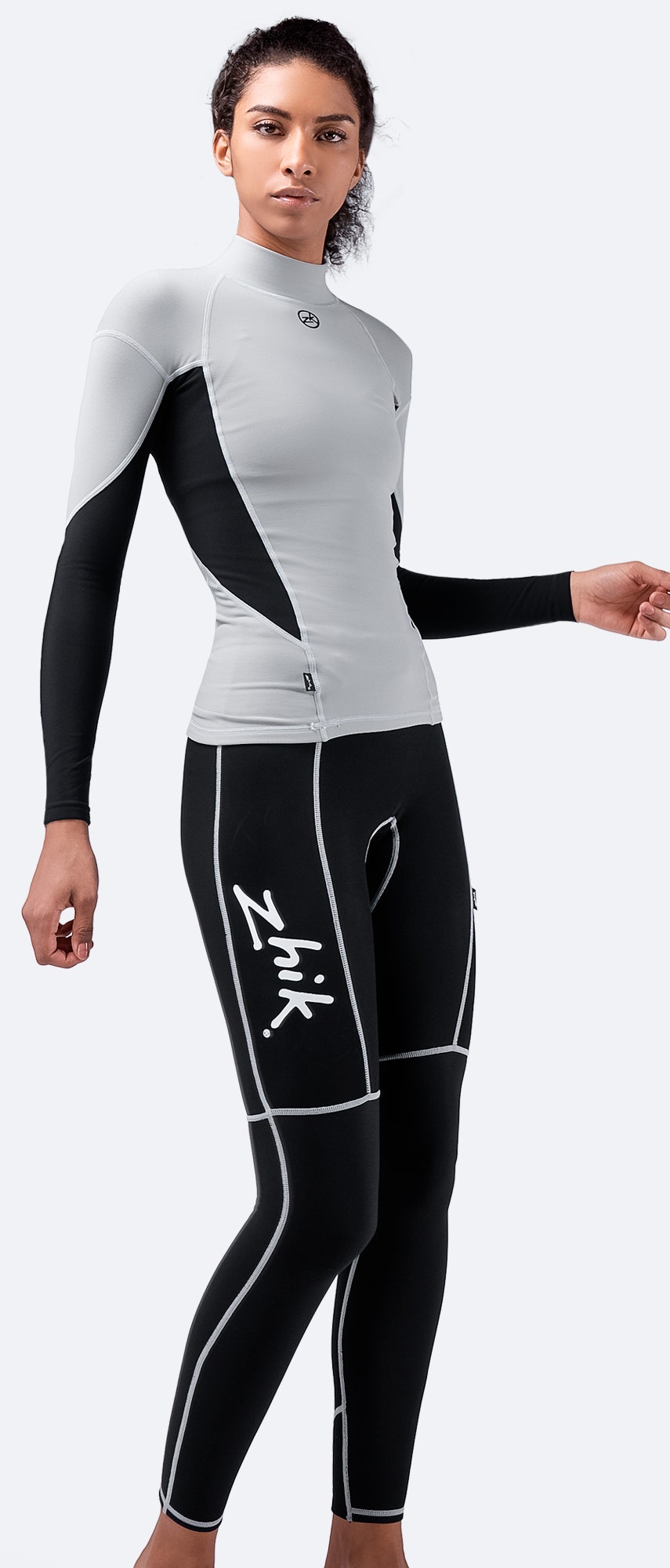 Side view of Zhik Hydrophobic Fleece Pants in black, highlighting sleek fit, flexible spandex fabric, and water-resistant outer layer.