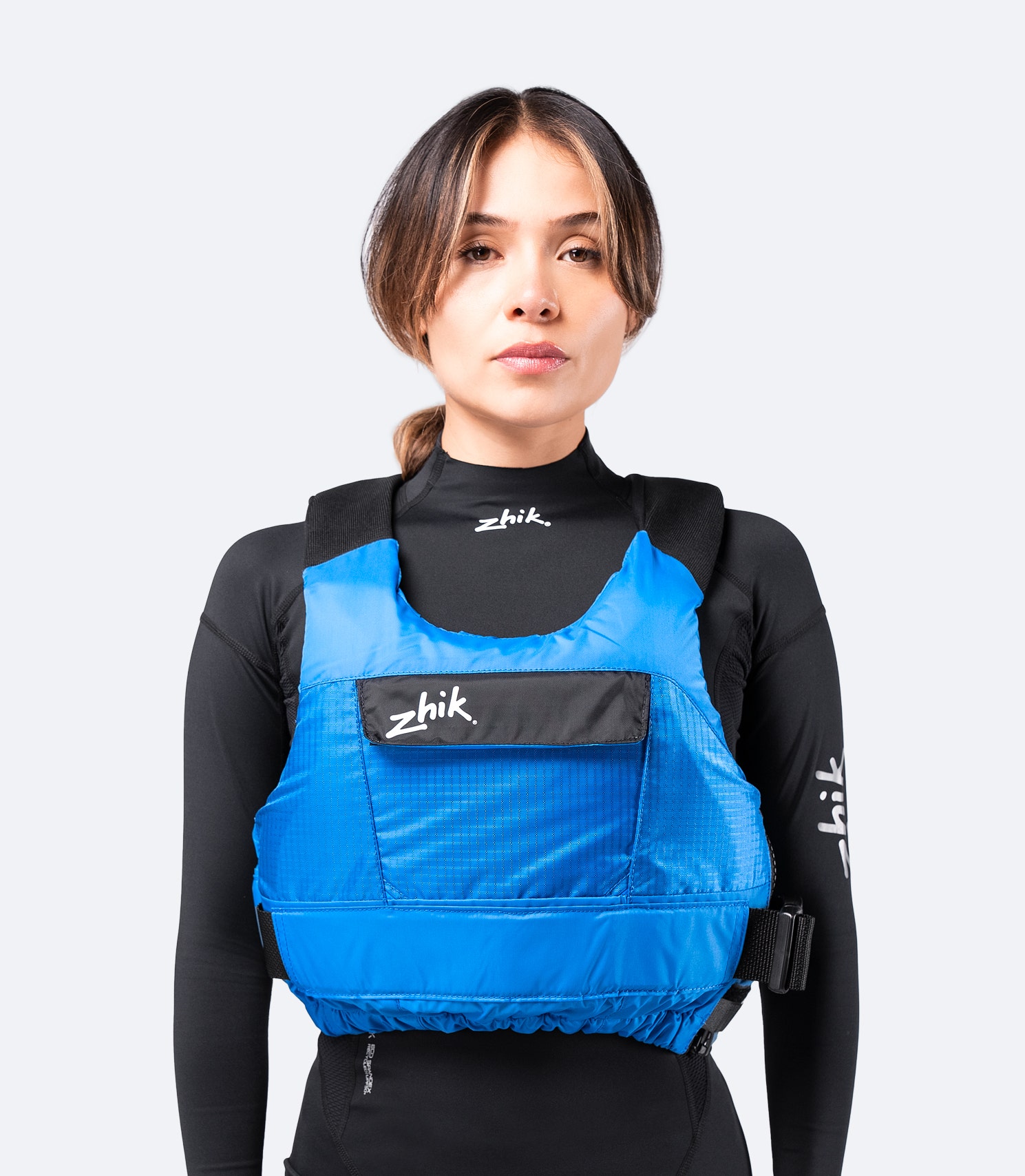 Zhik P3 PFD in blue, front-facing view showing high-performance design with an easy-access front pocket and race-cut fit.