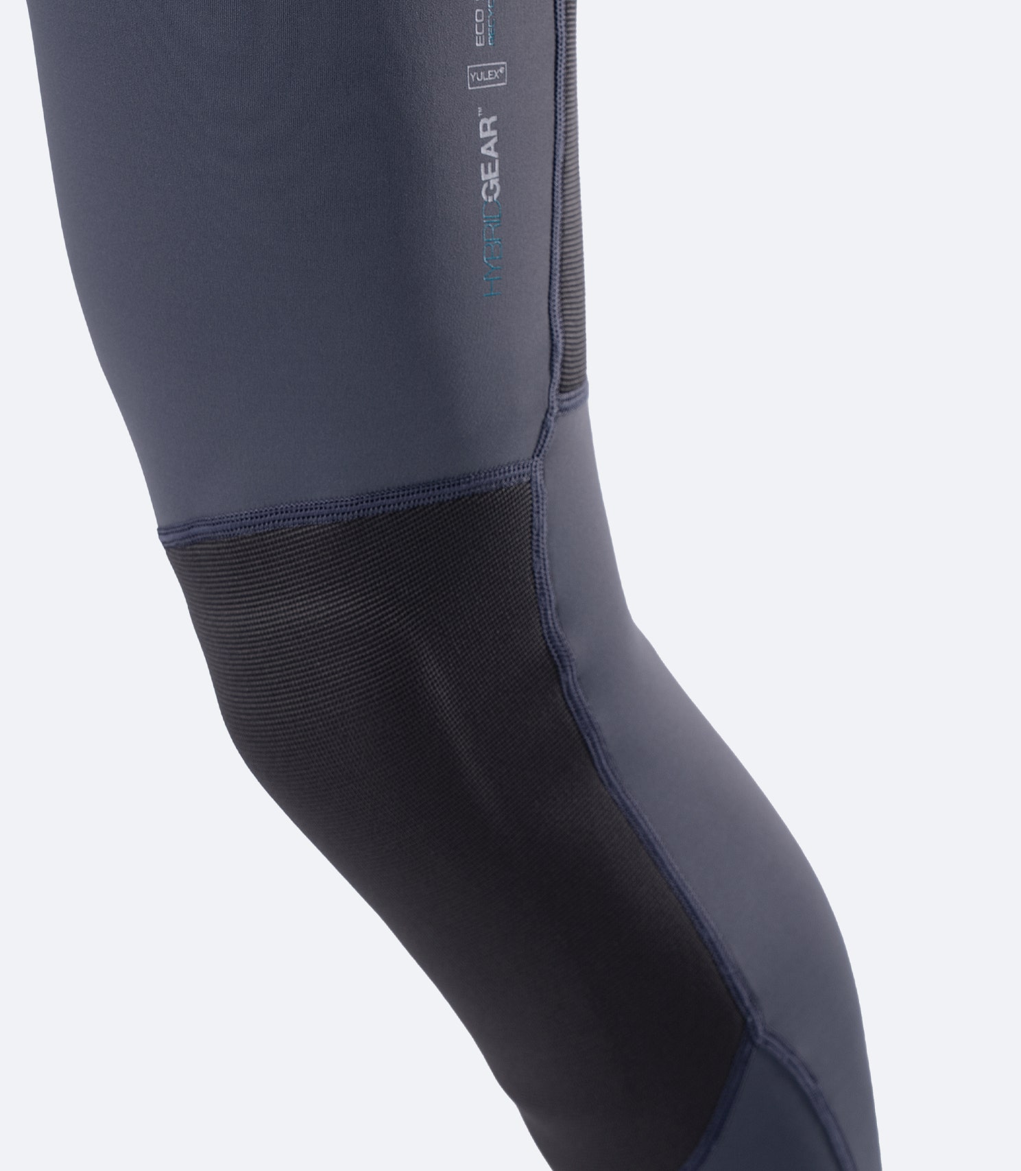 Close-up of ZhikTex II knee panels on Grey Zhik Hybrid Gear™ Performance Pants for abrasion resistance