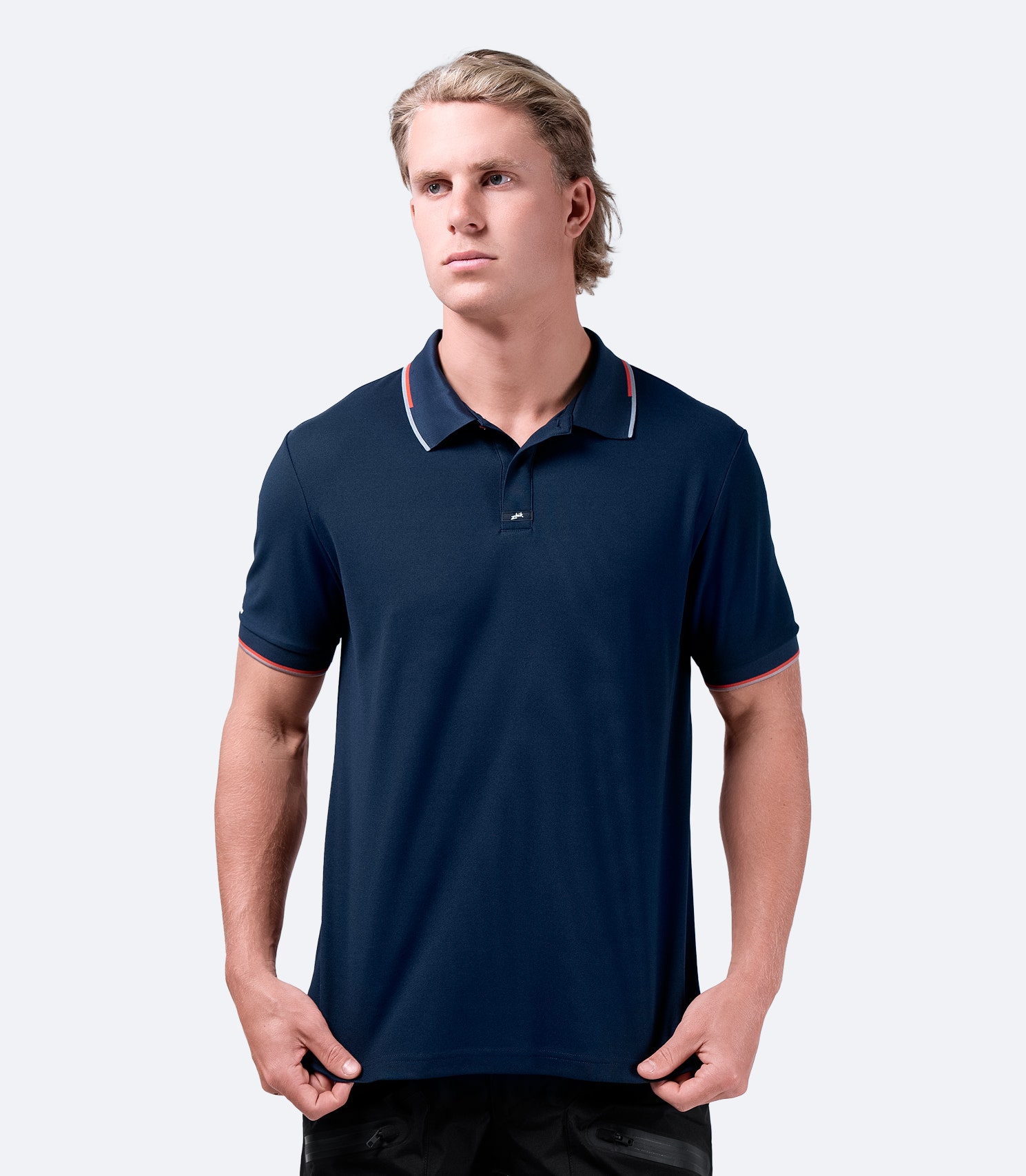 Front view of Zhik Men's Elite Polo in navy, designed for performance with breathable quick-dry fabric and contrast details.