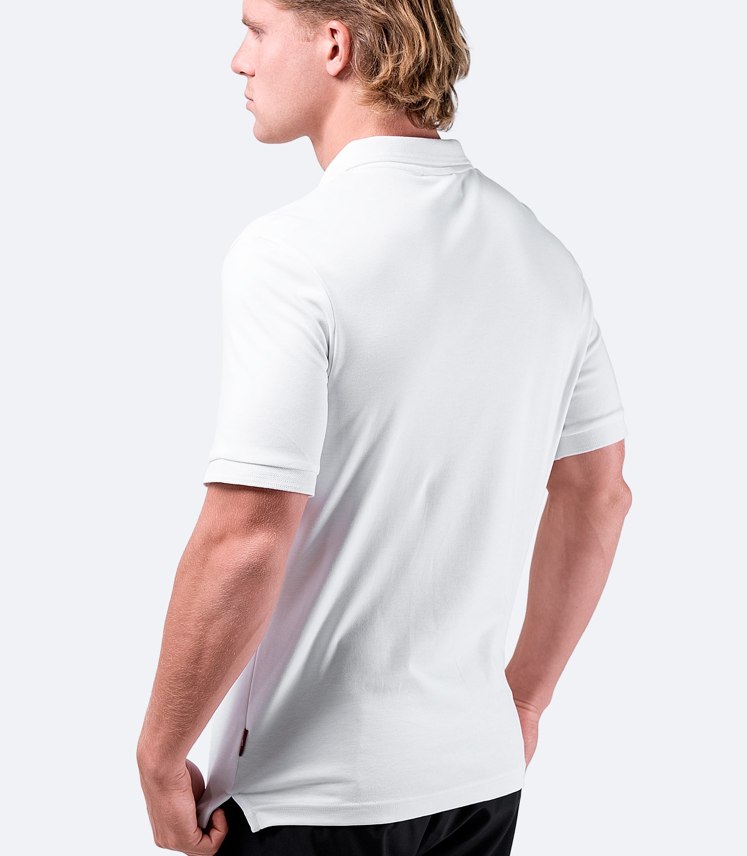 Zhik Men's Pima Cotton Polo in white, close-up of rear collar and smooth Supima cotton fabric.