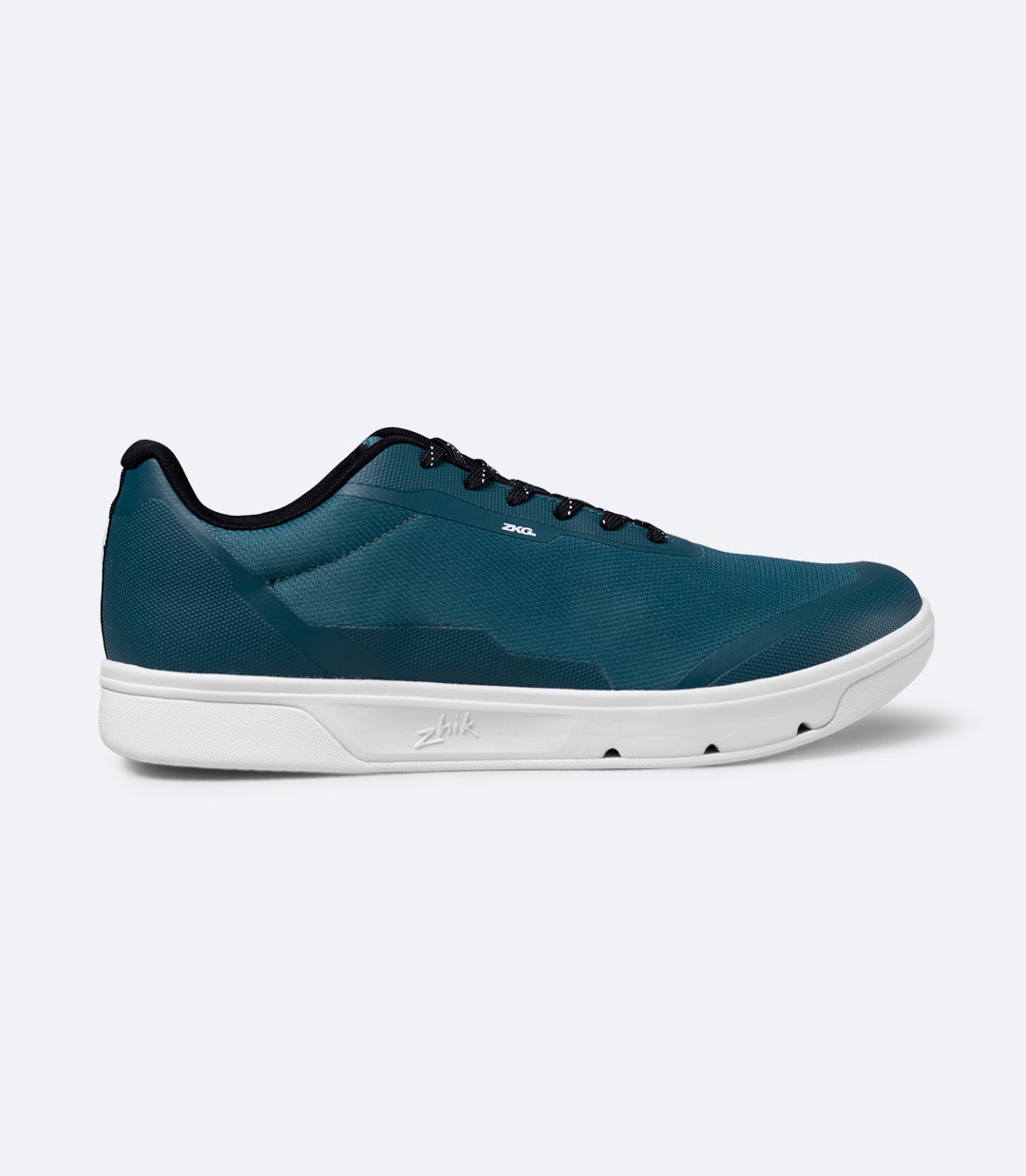 Side view of Zhik ZKG Amphibious Shoe in deep teal, showing breathable mesh upper and casual deck style