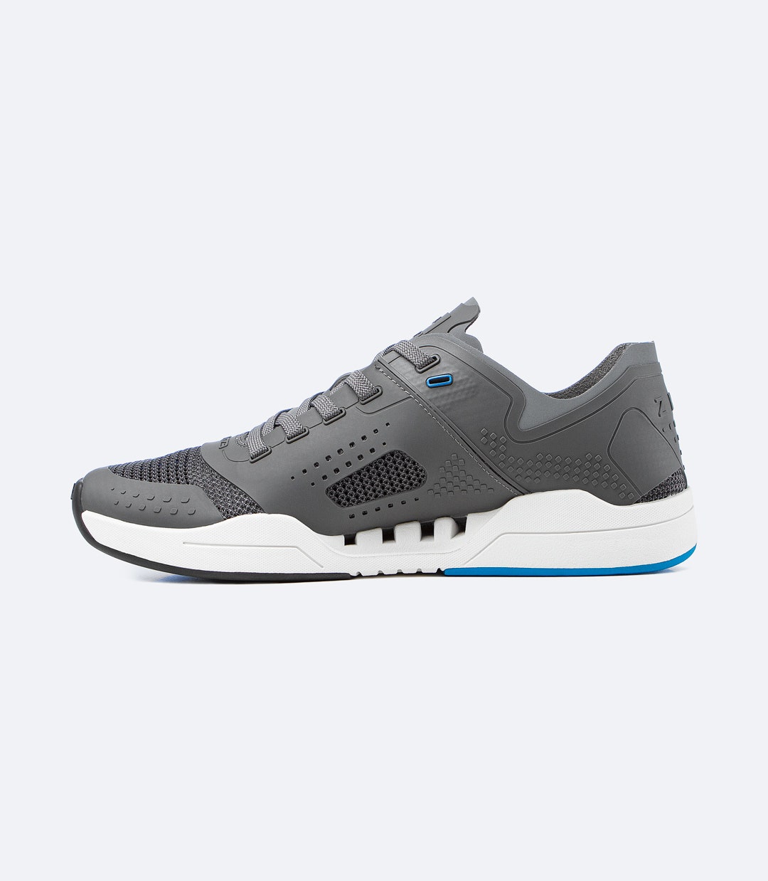 Zhik Fuze shoe in grey, left-side profile with perforated upper panels for breathability and EVA sole for impact cushioning.