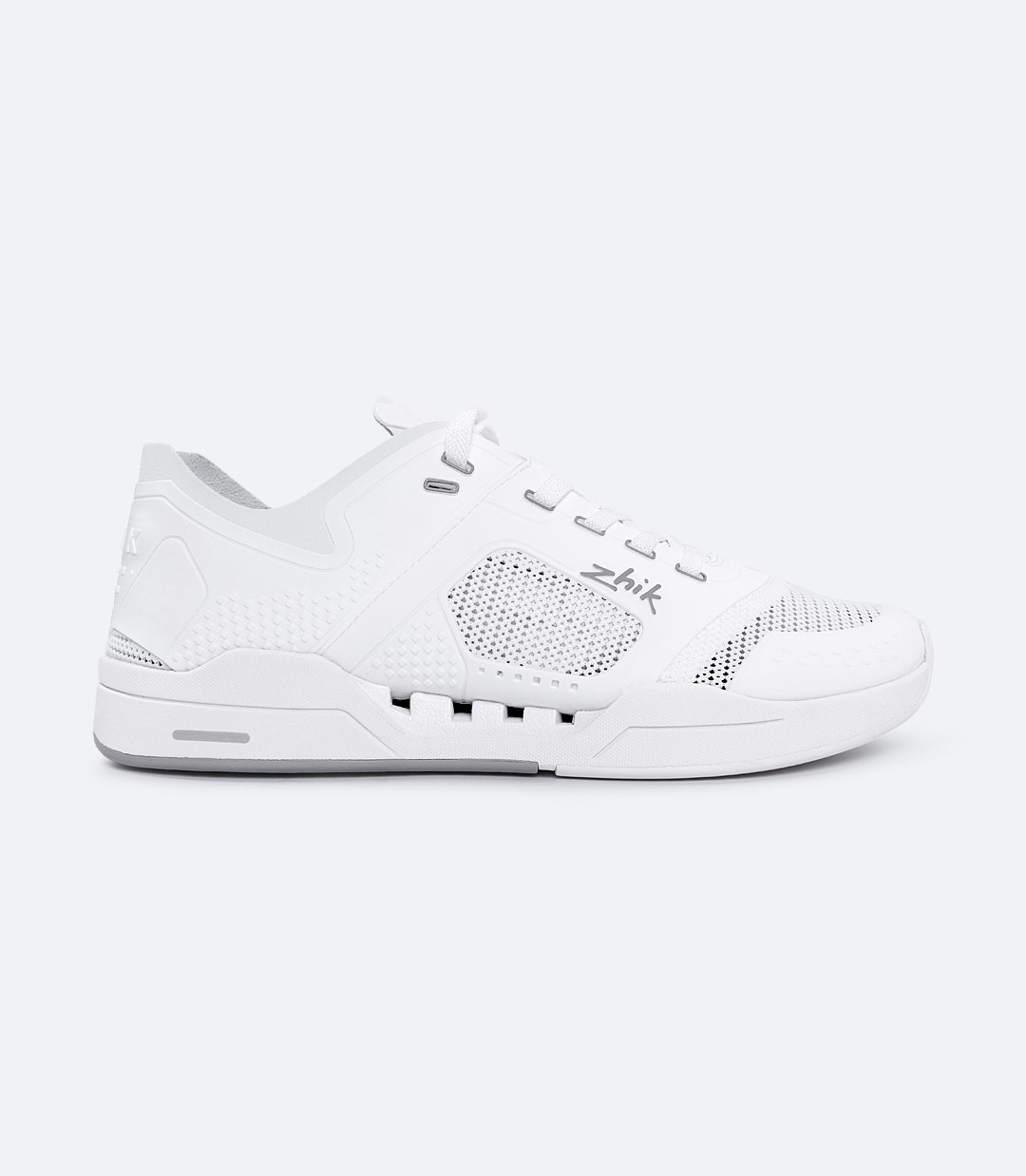 Zhik Fuze shoe in white, side view showing lightweight breathable upper, reinforced PU support, and high-grip non-marking sole.