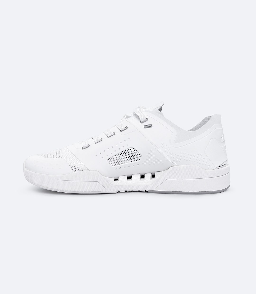 Zhik Fuze shoe in white, left-side profile with perforated upper panels for breathability and EVA sole for impact cushioning.