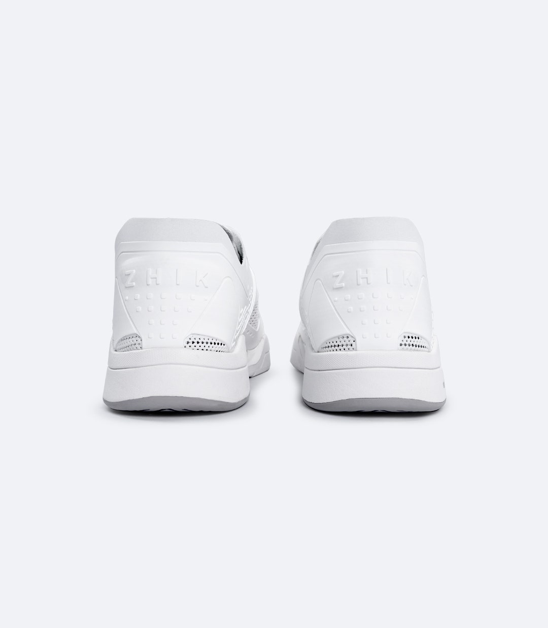 Zhik Fuze shoe in white, rear angle highlighting breathable moulded upper, reinforced PU support, and flexible cushioned EVA sole.