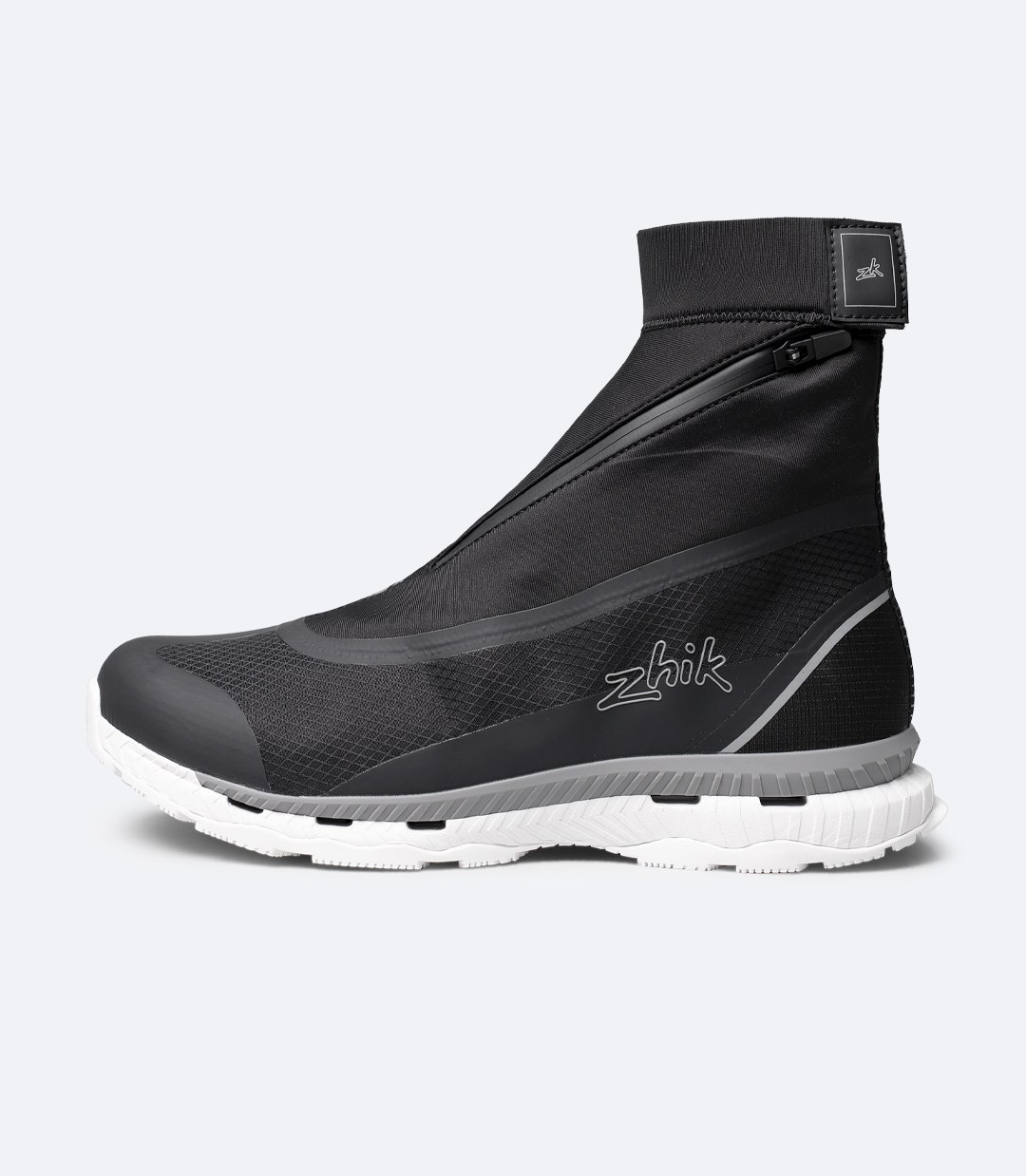 Inner side view of Black Zhik Surge X waterproof race shoe with velcro ankle strap and ripstop heel panel