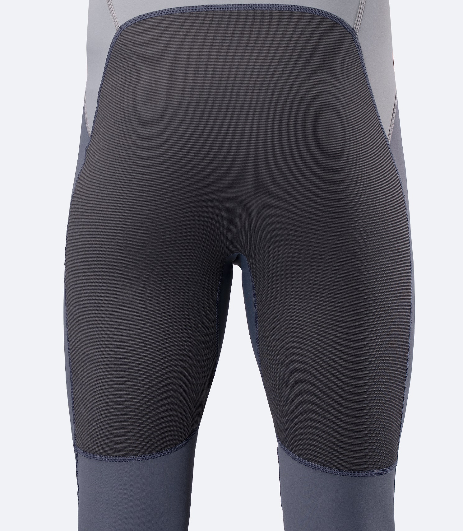 Close-up of Zhik Youth Hybrid Gear Performance Skiff Suit in Grey showing ZhikTex II reinforced seat for durability