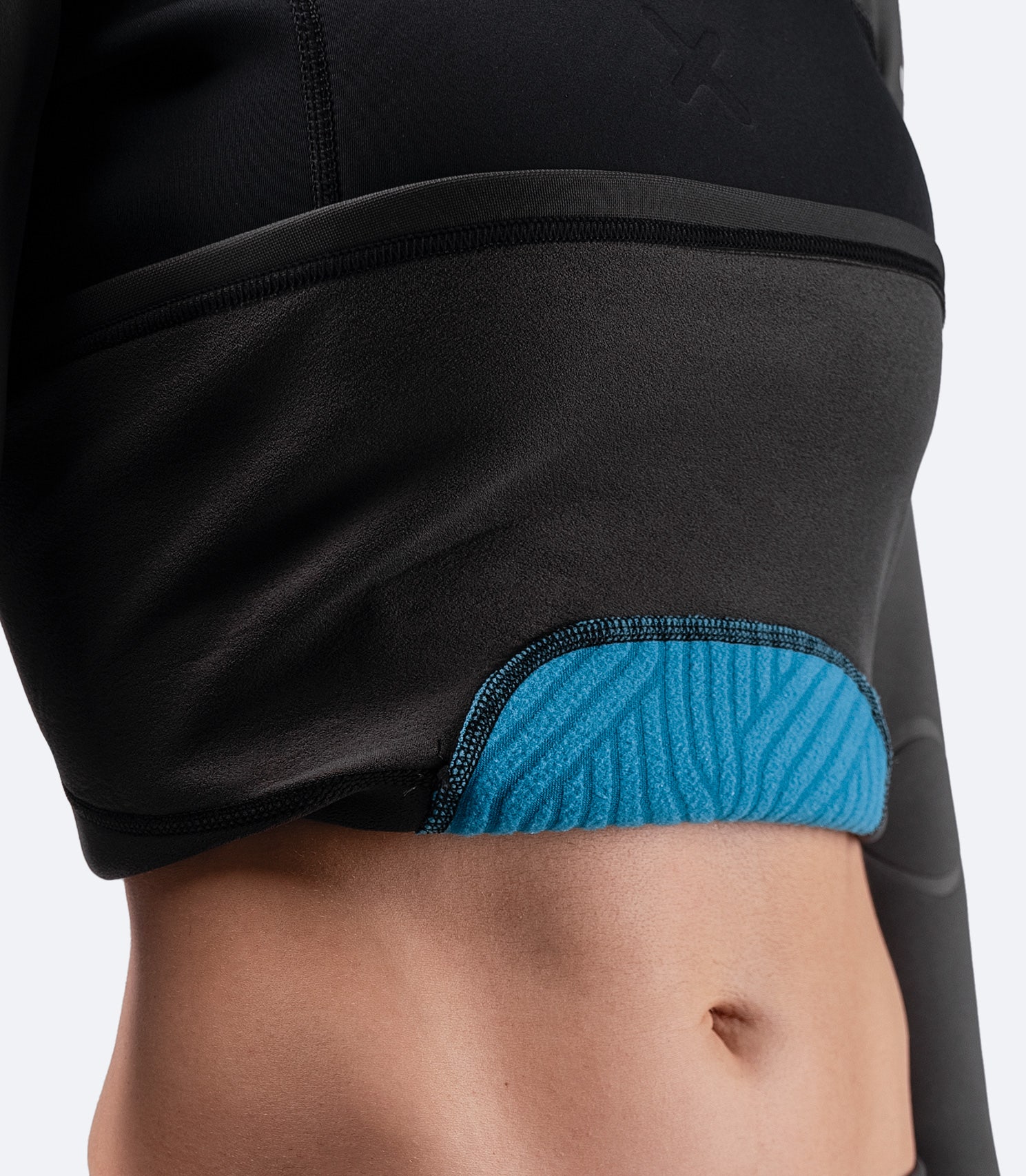 Close-up of Zhik Women's MicrofleeceX Skiff Suit’s graphene-infused lining, offering optimal insulation and eco-friendly performance.