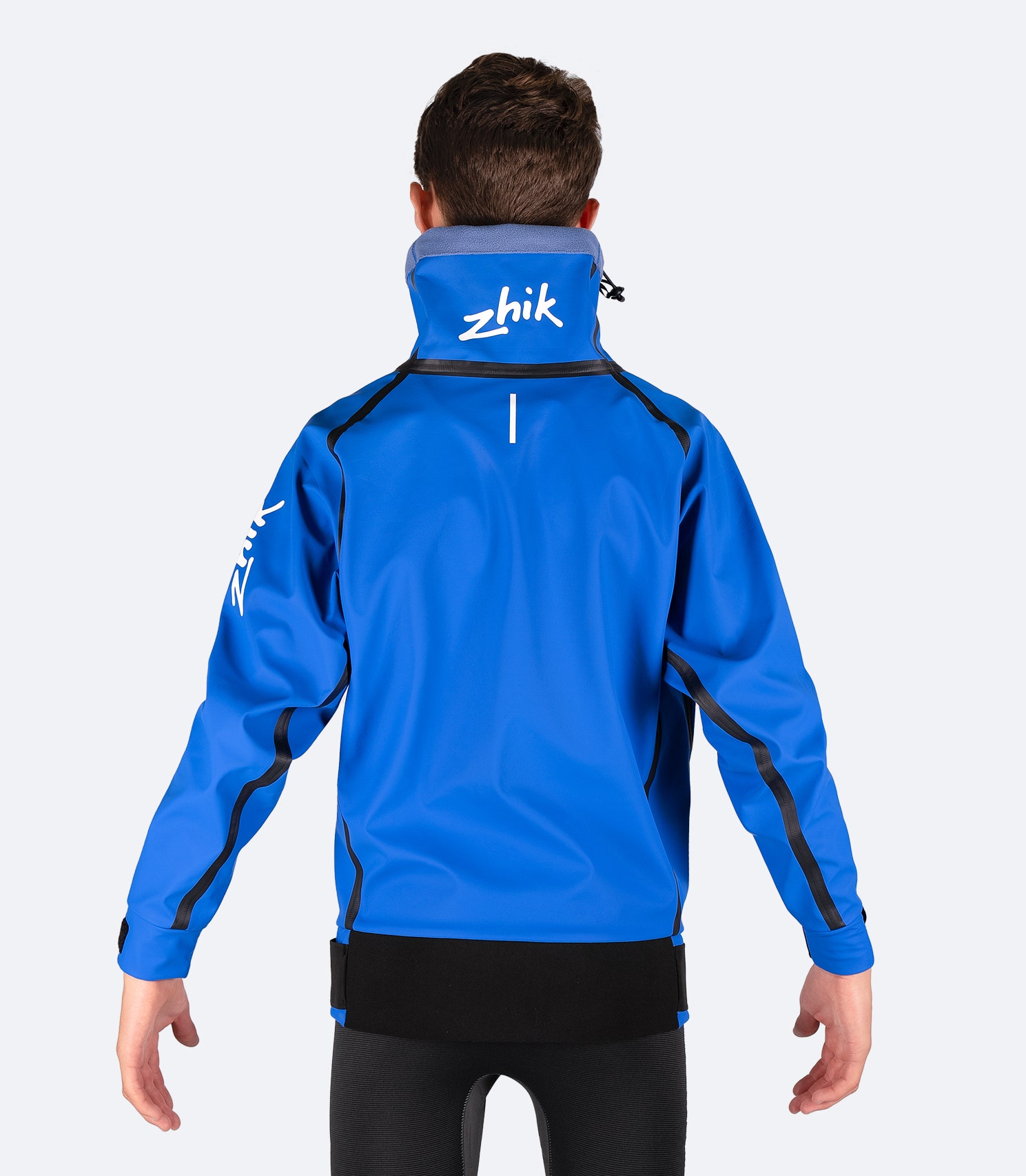 Back view of Zhik Youth Shedding Smock in Blue with adjustable neoprene waistband for a secure, watertight seal