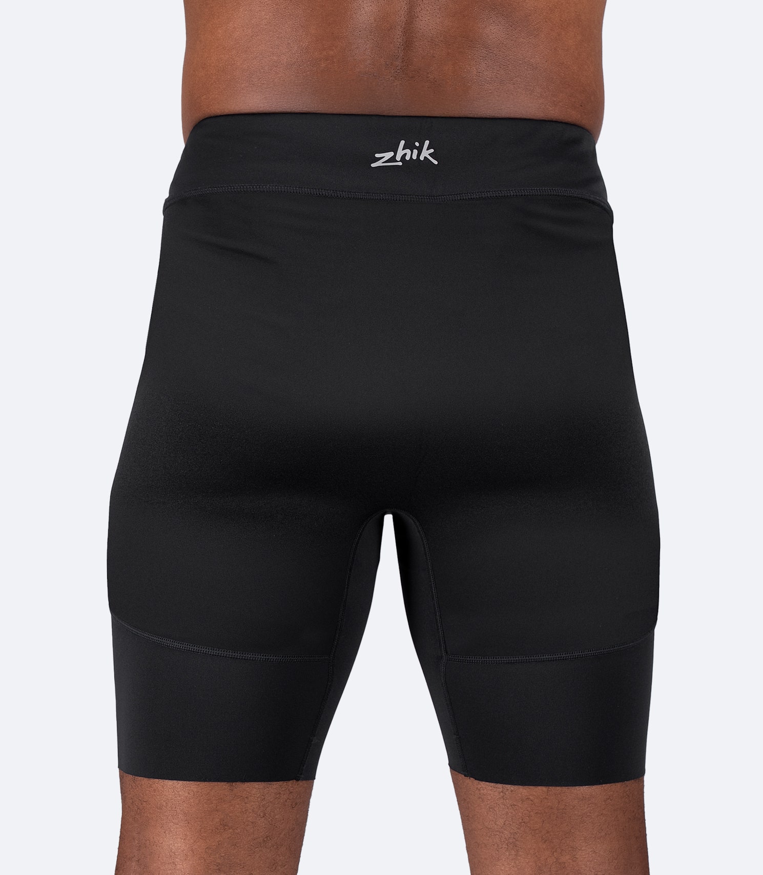 Rear view of Zhik Men's Performance Paddle Short in black featuring chafe-free design and adjustable leg length.