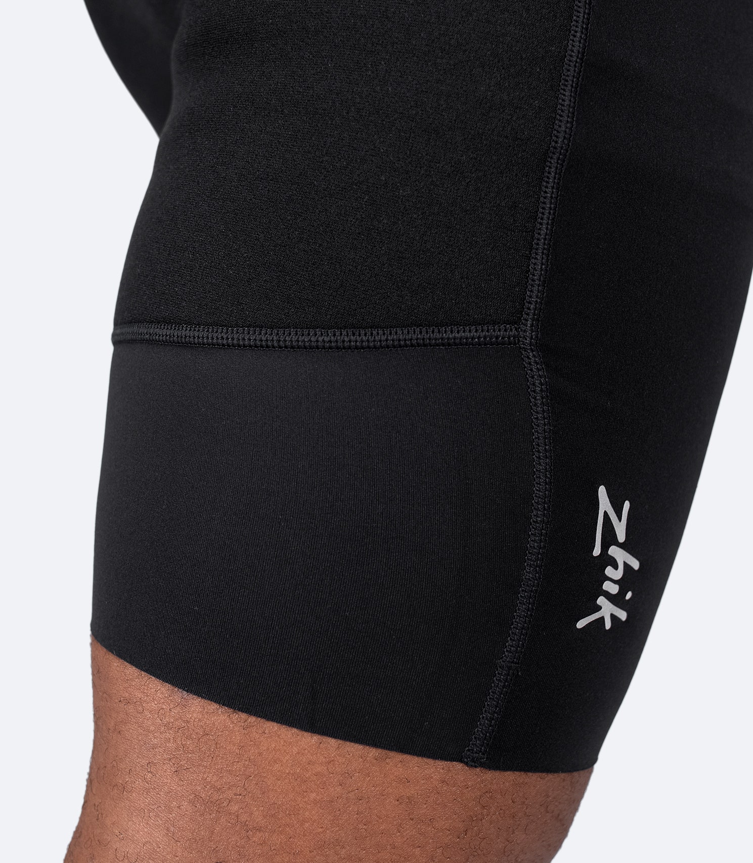 Mens Padded Spandex Paddle Pants, close up showing stitching and padded panel