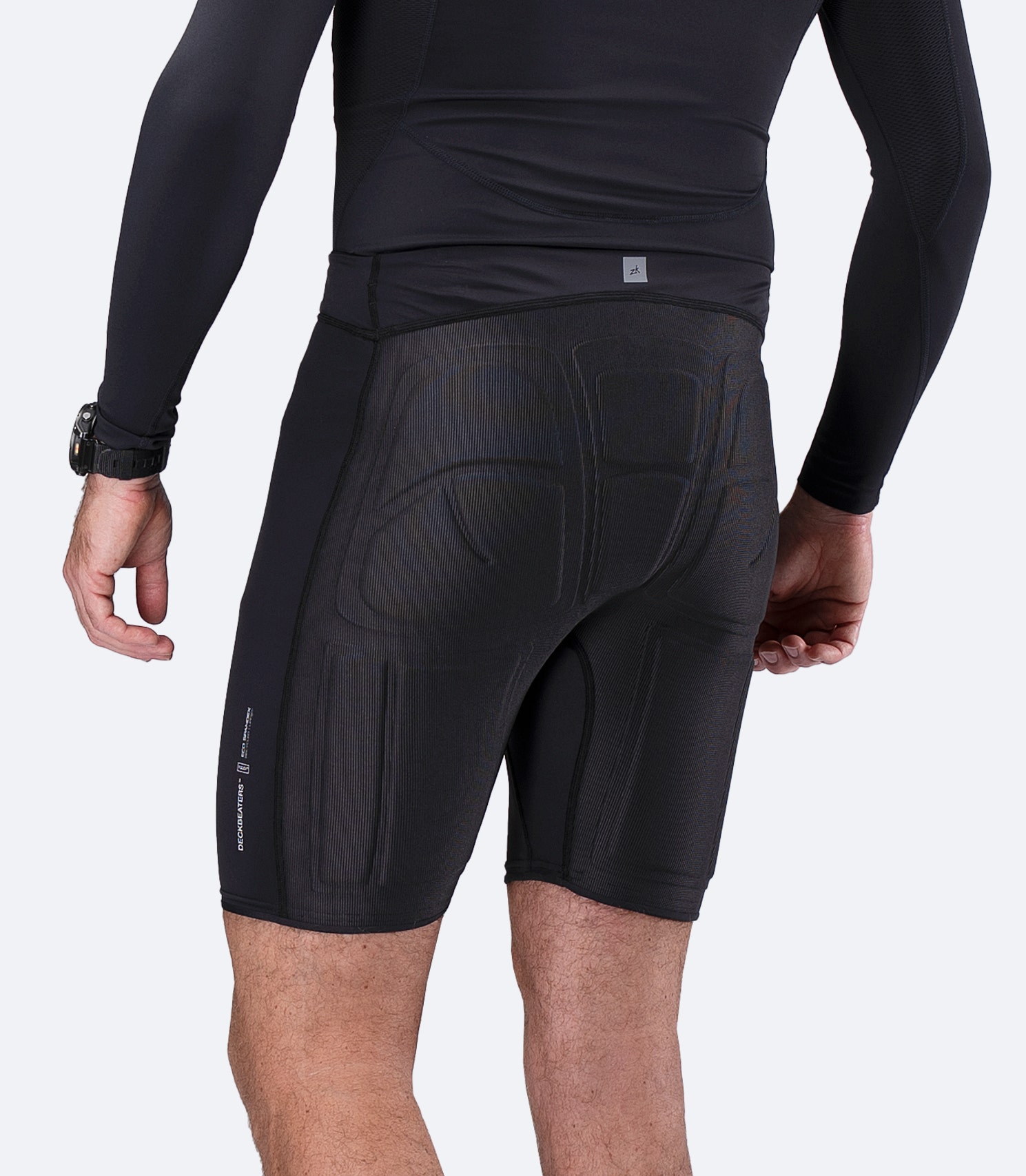 Rear view of Zhik DeckBeater X Short in Black, showing compression-molded seat panel and performance fit for hiking comfort