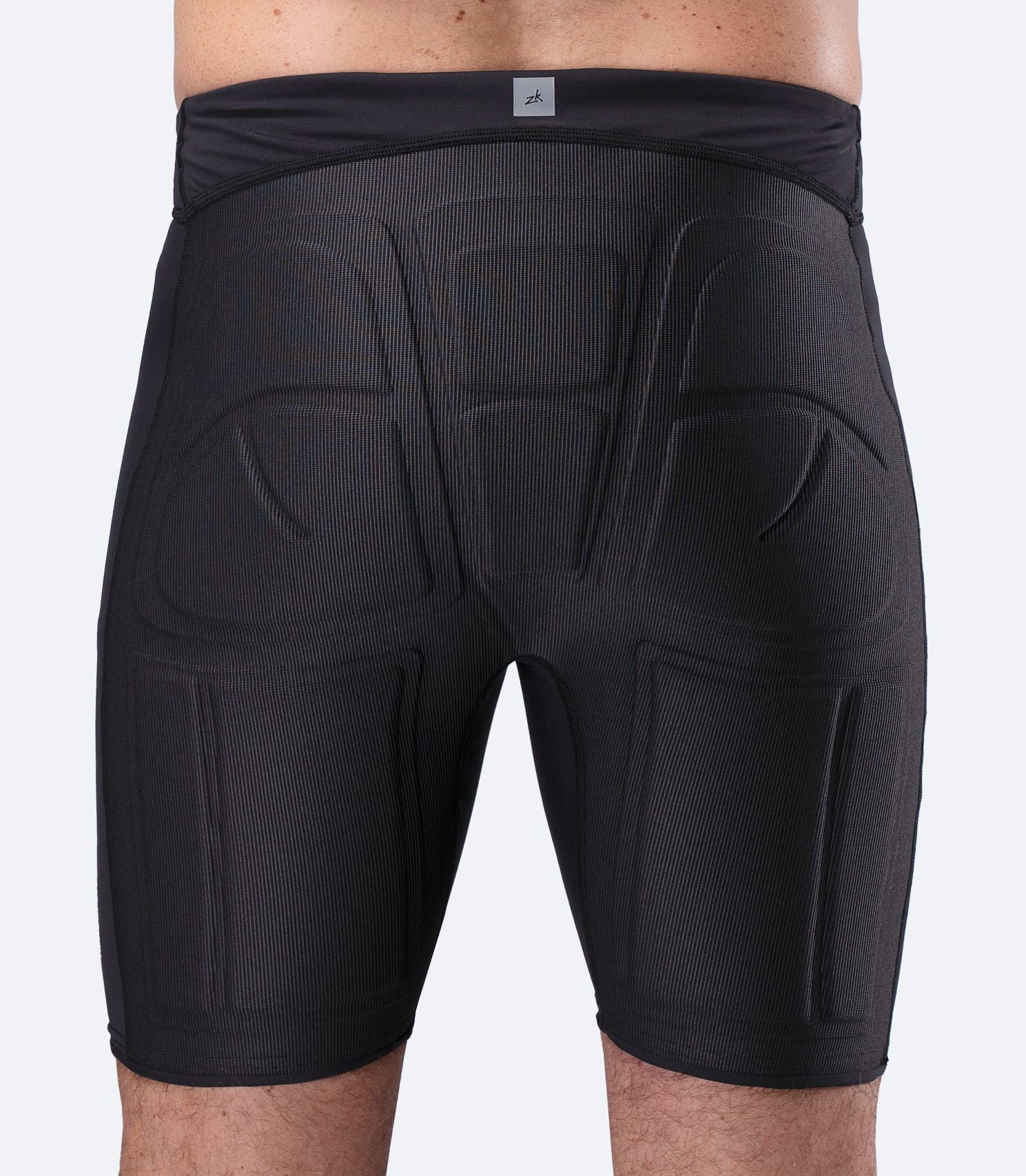 Close-up of Zhik DeckBeater X Short seat padding in Black, with compression-molded protection for hard deck surfaces and edges