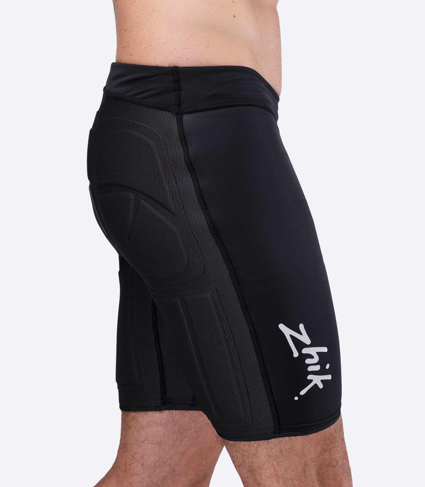 Side view of Zhik DeckBeater X Short in Black, featuring Zhik logo and streamlined coverage for warm weather dinghy hiking