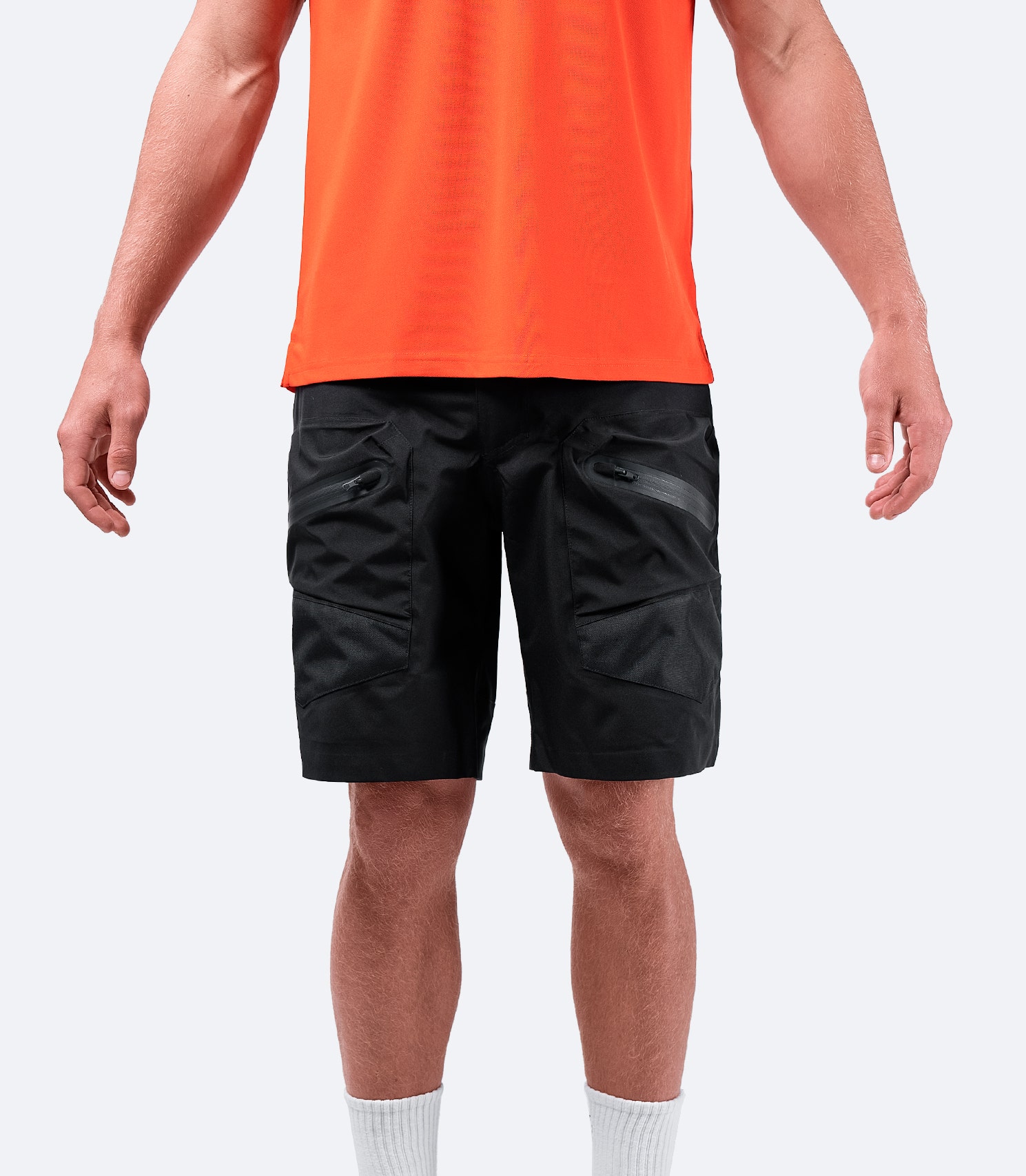 Zhik INS200™ Waterproof Shorts in black worn casually, demonstrating lightweight and breathable fabric for inshore sailing.