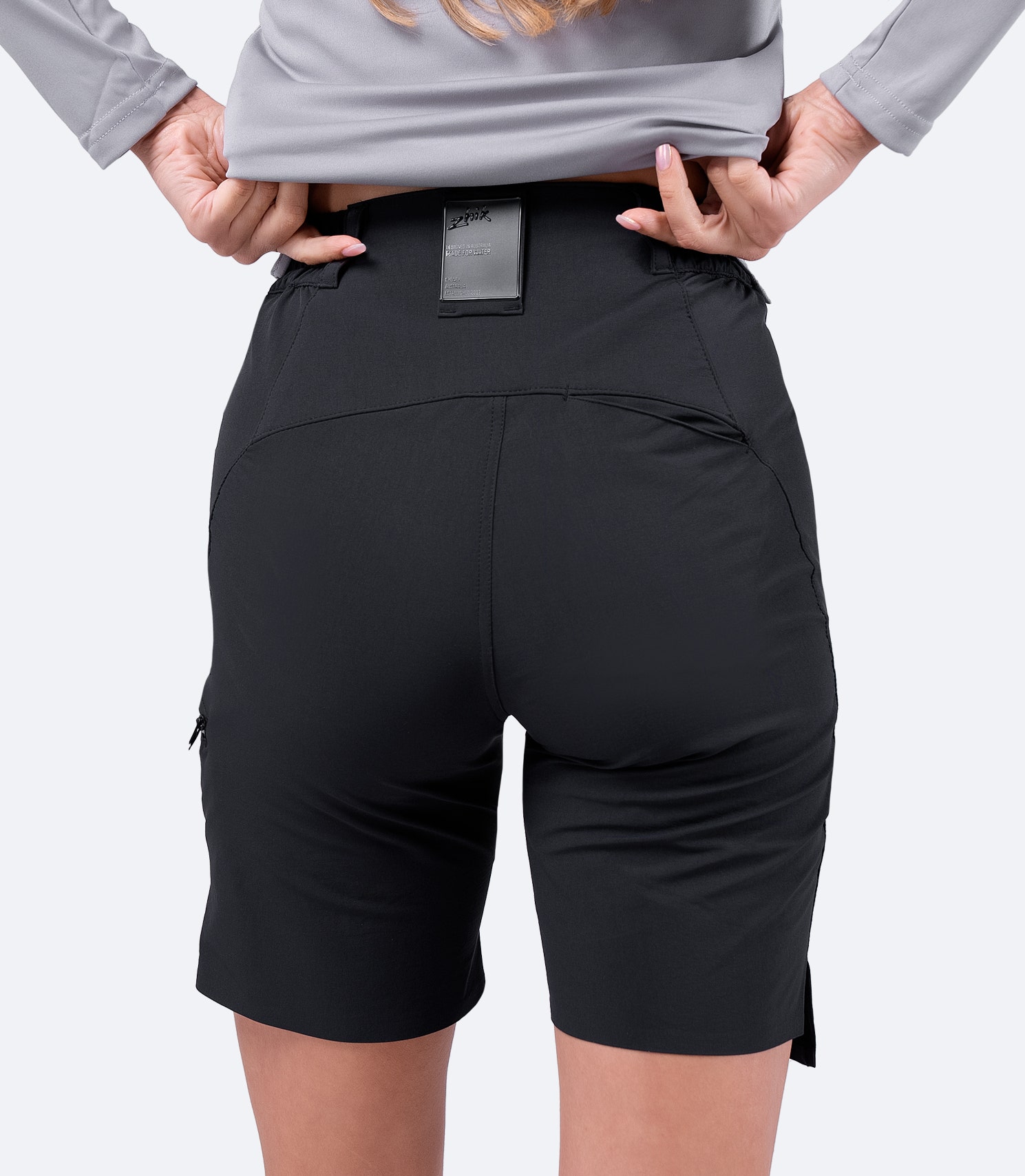 Rear view of Zhik Women's Black Deck Shorts highlighting the semi-elasticated waistband and rear pocket for comfort and functionality