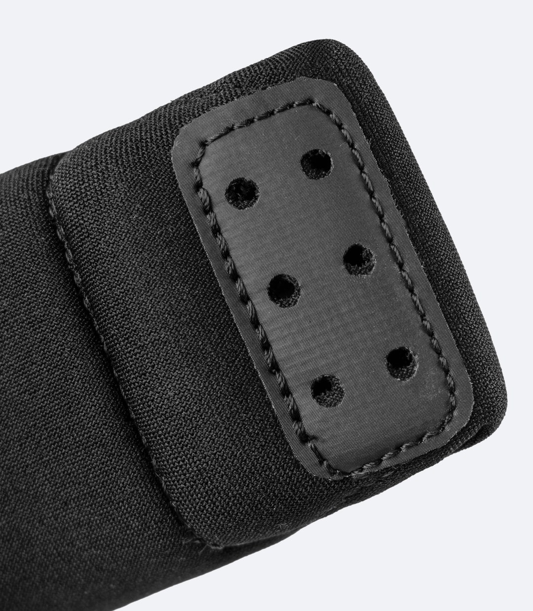 Close-up of the side of Zhik Elite Foot Strap, showing the neoprene padded cover and reinforced webbing for durability and comfort