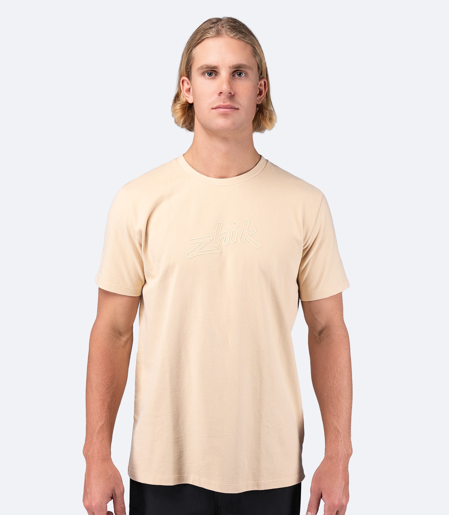 Zhik Men's Logo Cotton T-Shirt in Sand with a crew neck collar, relaxed fit, and 3D cast logo