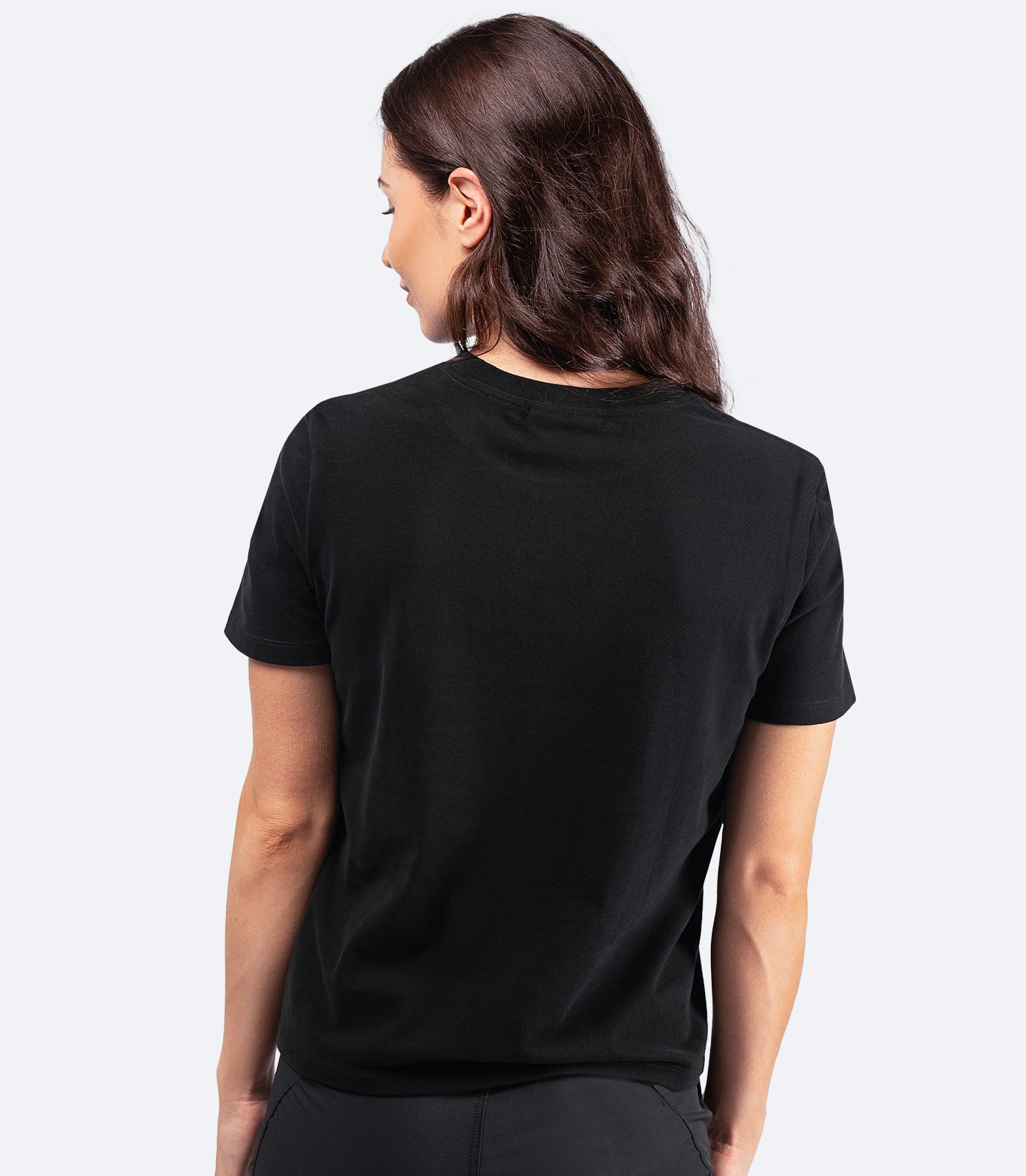 Back view of Women's Zhik Logo Cotton T-Shirt in black, showing boxy silhouette and lightweight cotton for comfort on and off the water