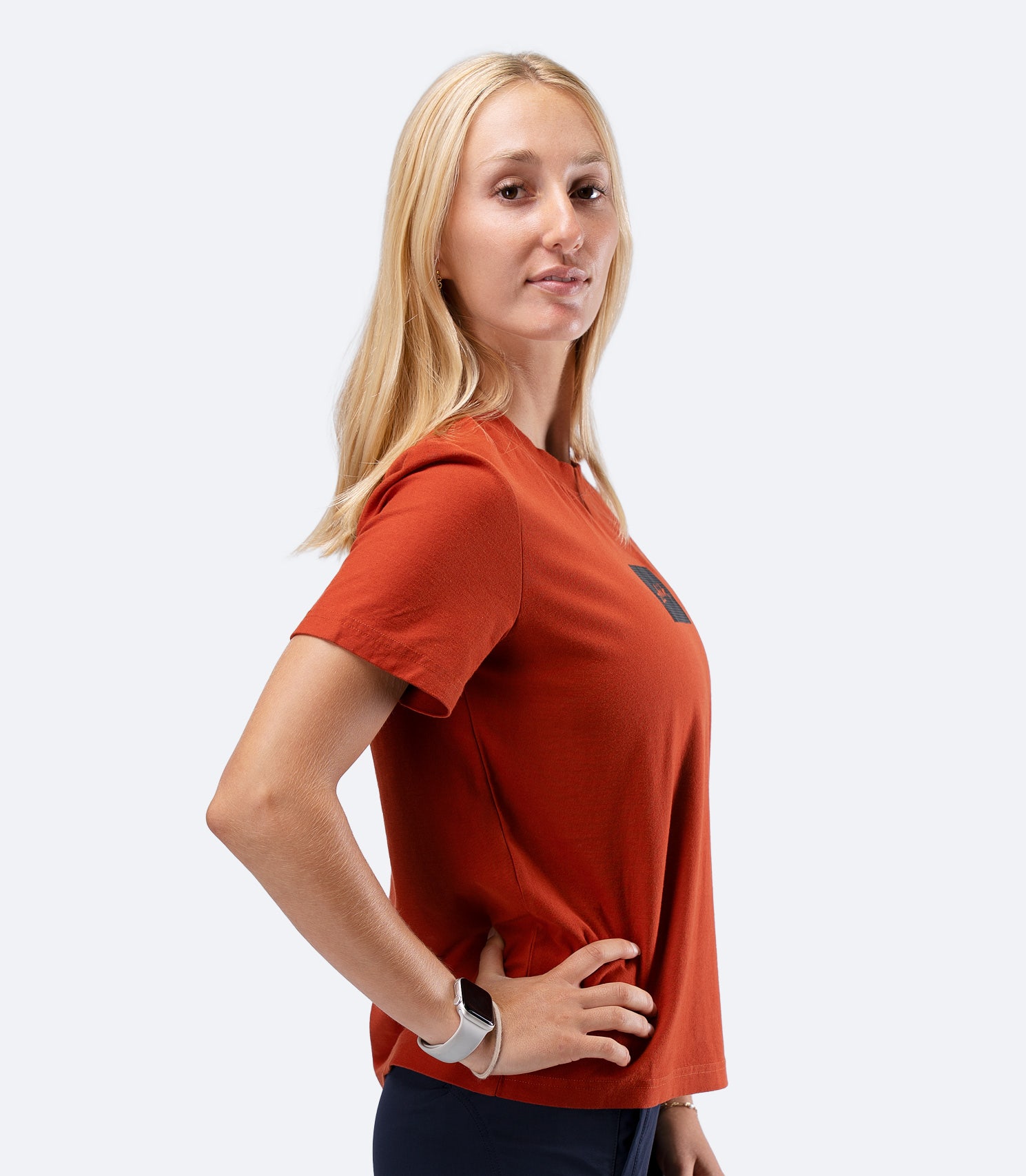 Zhik Womens Carbon T-Shirt in Red Earth, side product view highlighting sleeve length and relaxed profile