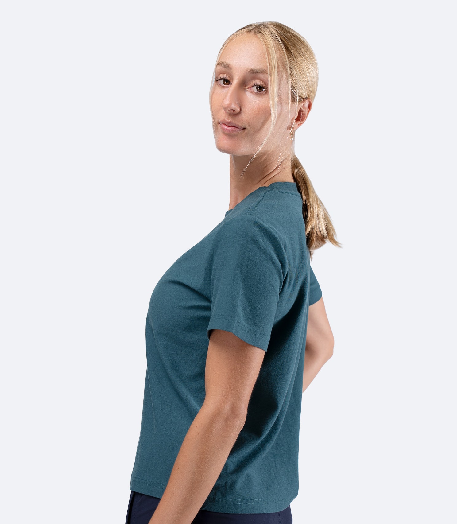 Zhik Womens Carbon T-Shirt in Deep Teal, side product view highlighting sleeve length and relaxed profile