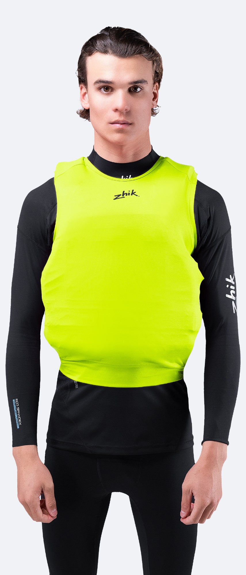 Hi-Vis Yellow Zhik Spandex Event Pinnie with 3D body panelling, anti-rash flatlock stitching, and a raw edge for unrestricted movement.