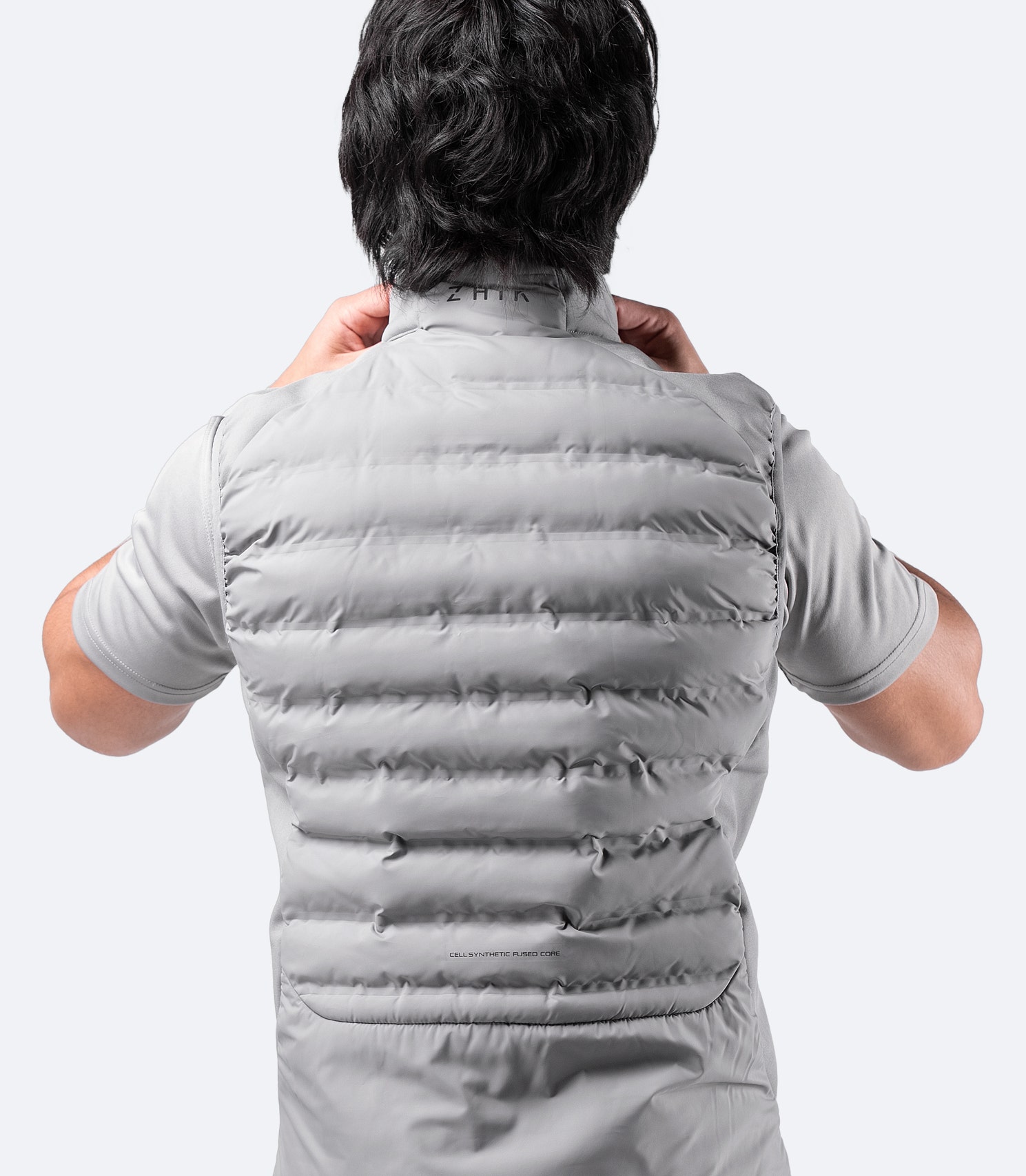 Men’s Platinum Cell Insulated Vest rear view – wind-resistant, water-repellent outer with fused baffling for insulation stability.