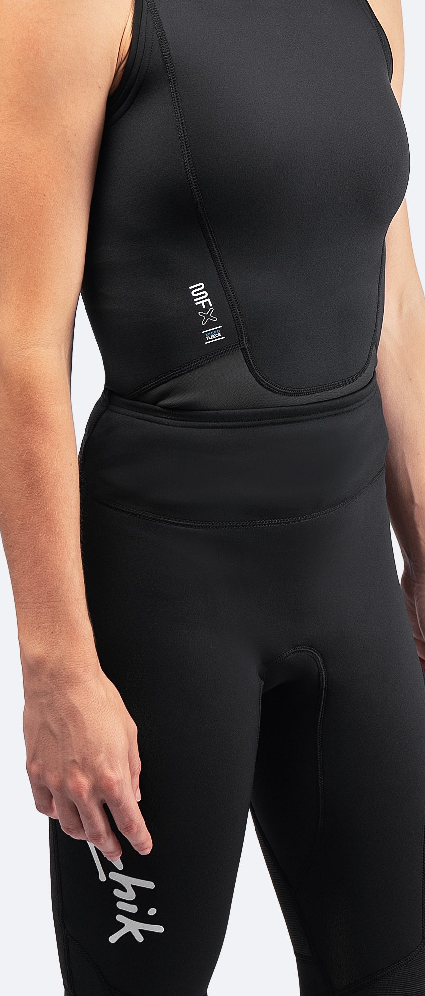 Chest and waist view of Zhik Women's MicrofleeceX Sleeveless Top, featuring Yulex® rubber and waist panel for use with Microfleece™ X pants