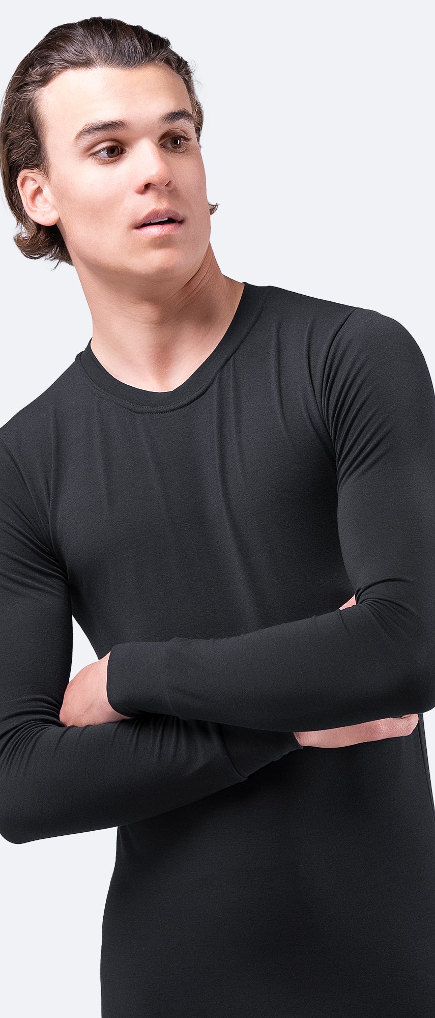 Unisex Zhik Core Baselayer Top in black, front view, figure-fitting with lightweight insulation.