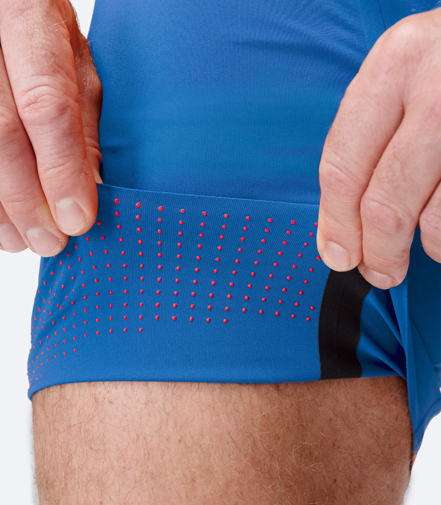 Zhik Men’s X Unisuit in Blue folded inside out to show silicone grip zones and lightweight fabric.
