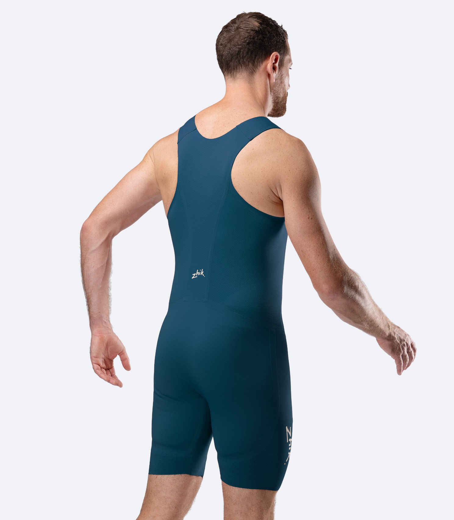 Zhik Men’s X Unisuit in Deep Teal rear view with breathable mesh back panel and ergonomic fit.