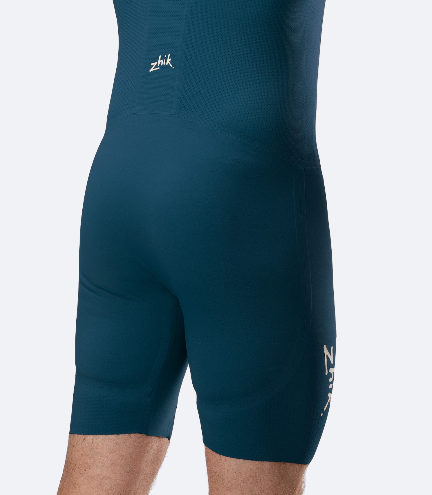 Rear close-up of Zhik Men’s X Unisuit in Deep Teal showing leg fit, fused seams and silicone grip zones.