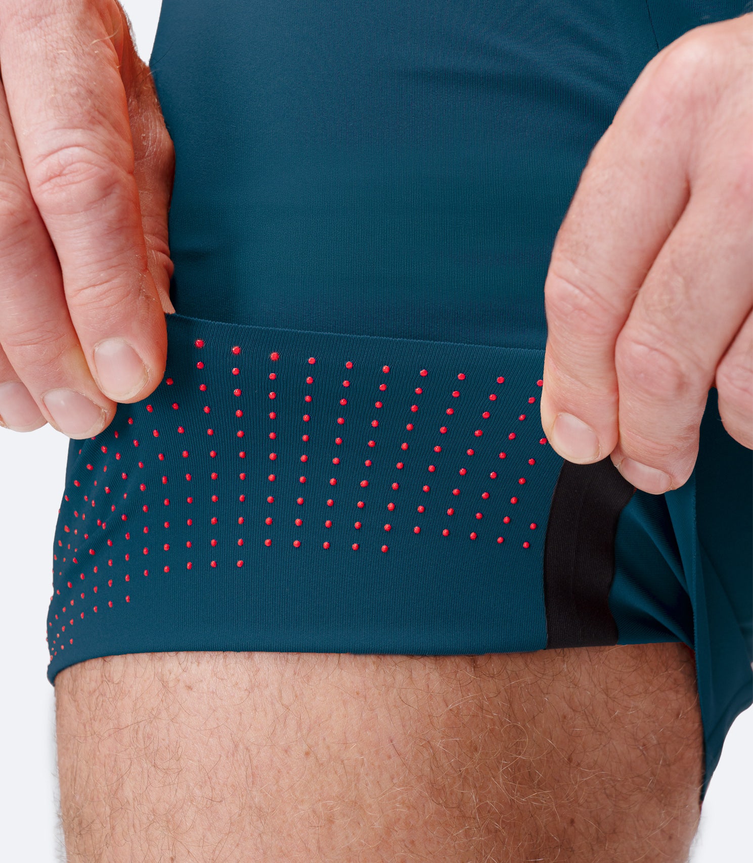 Zhik Men’s X Unisuit in Deep Teal folded inside out to show silicone grip zones and lightweight fabric.