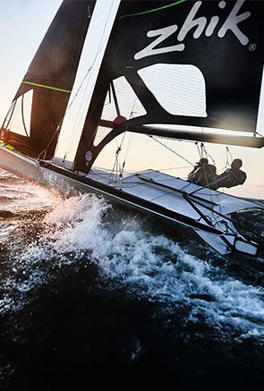 Men on Zhik branded sailboat